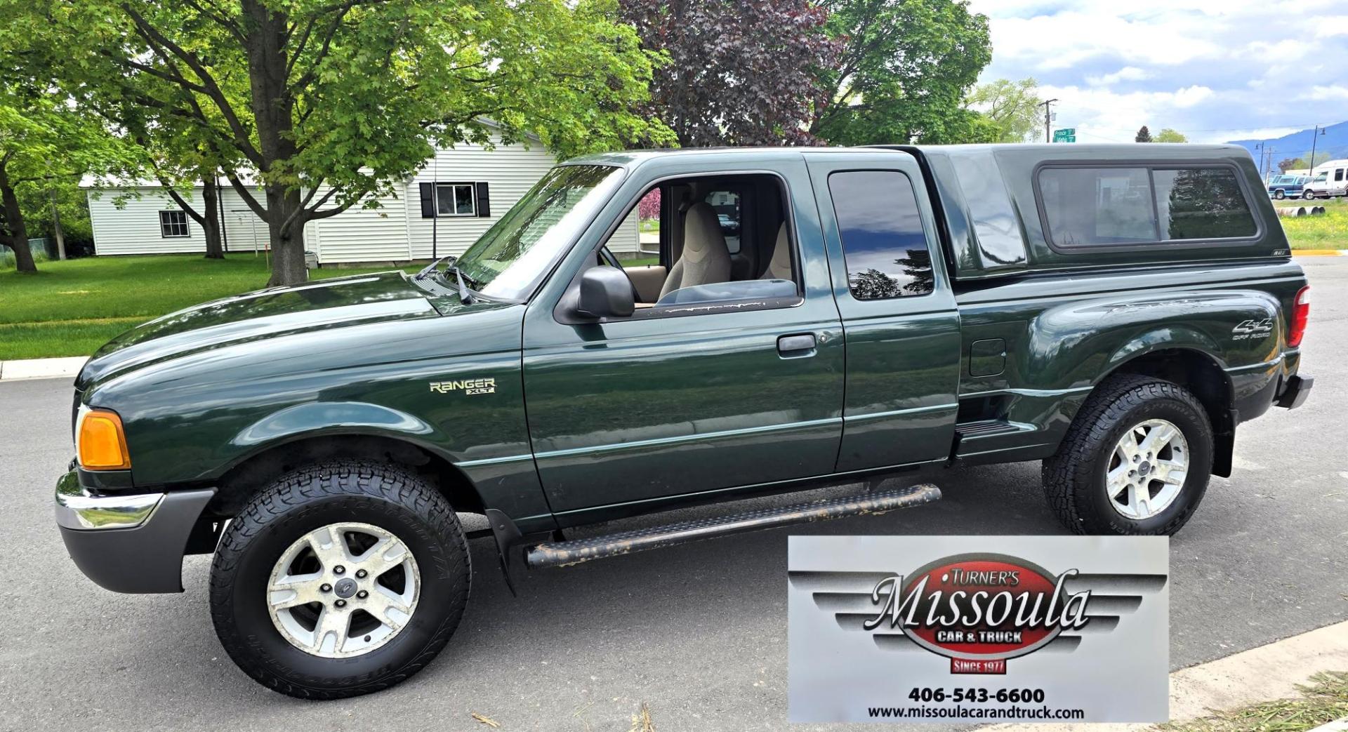 2002 Green /Black Ford Ranger Edge Plus SuperCab 4WD (1FTZR45E92P) with an 4.0L V6 SOHC 12V engine, 5-Speed Automatic Overdrive transmission, located at 450 N Russell, Missoula, MT, 59801, (406) 543-6600, 46.874496, -114.017433 - Hard to come by smaller 4WD Truck. 4.0L V6 Engine. Automatic Transmission. Nice Matching Topper. Air. Cruise. Tilt. Power Windows and Locks. AM FM CD Player. Towing. Running Board. Engine is Strong and Body is Straight. Paint has a few blemishes. Because of the age, financing is not available th - Photo#0