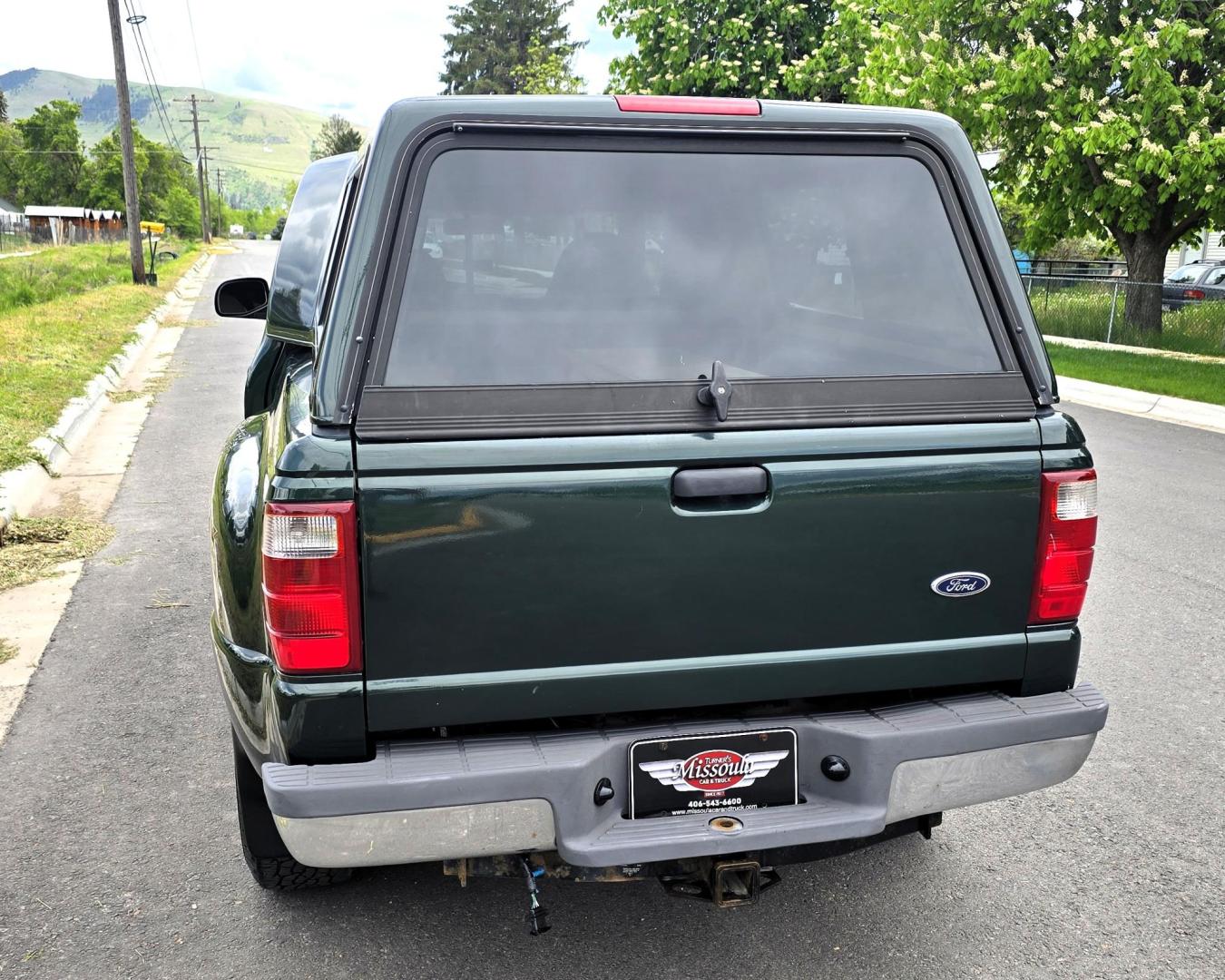2002 Green /Black Ford Ranger Edge Plus SuperCab 4WD (1FTZR45E92P) with an 4.0L V6 SOHC 12V engine, 5-Speed Automatic Overdrive transmission, located at 450 N Russell, Missoula, MT, 59801, (406) 543-6600, 46.874496, -114.017433 - Hard to come by smaller 4WD Truck. 4.0L V6 Engine. Automatic Transmission. Nice Matching Topper. Air. Cruise. Tilt. Power Windows and Locks. AM FM CD Player. Towing. Running Board. Engine is Strong and Body is Straight. Paint has a few blemishes. Because of the age, financing is not available th - Photo#7