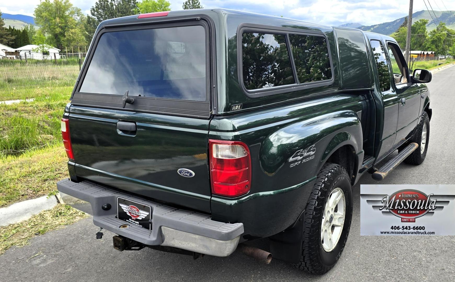 2002 Green /Black Ford Ranger Edge Plus SuperCab 4WD (1FTZR45E92P) with an 4.0L V6 SOHC 12V engine, 5-Speed Automatic Overdrive transmission, located at 450 N Russell, Missoula, MT, 59801, (406) 543-6600, 46.874496, -114.017433 - Hard to come by smaller 4WD Truck. 4.0L V6 Engine. Automatic Transmission. Nice Matching Topper. Air. Cruise. Tilt. Power Windows and Locks. AM FM CD Player. Towing. Running Board. Engine is Strong and Body is Straight. Paint has a few blemishes. Because of the age, financing is not available th - Photo#8