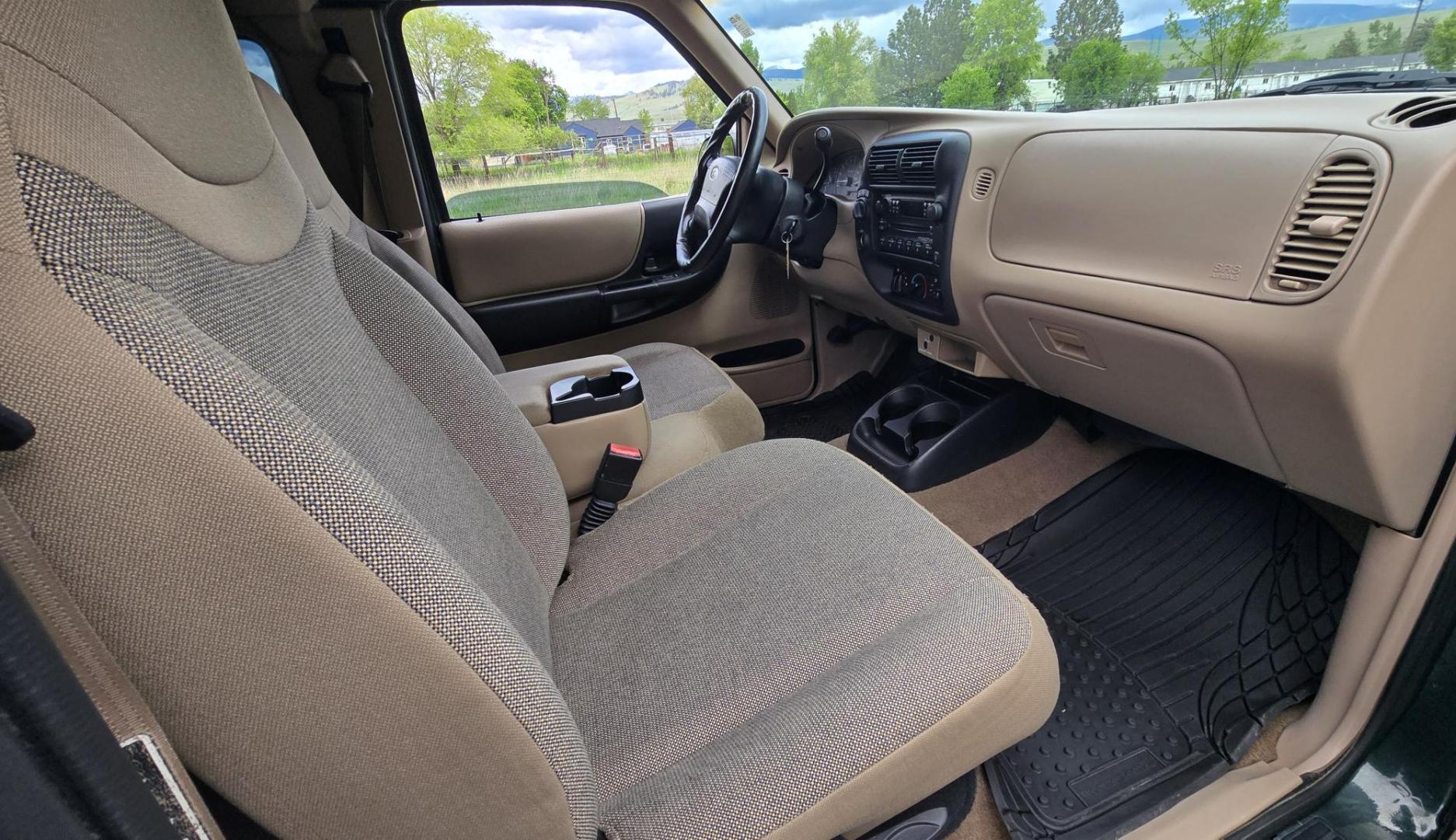 2002 Green /Black Ford Ranger Edge Plus SuperCab 4WD (1FTZR45E92P) with an 4.0L V6 SOHC 12V engine, 5-Speed Automatic Overdrive transmission, located at 450 N Russell, Missoula, MT, 59801, (406) 543-6600, 46.874496, -114.017433 - Hard to come by smaller 4WD Truck. 4.0L V6 Engine. Automatic Transmission. Nice Matching Topper. Air. Cruise. Tilt. Power Windows and Locks. AM FM CD Player. Towing. Running Board. Engine is Strong and Body is Straight. Paint has a few blemishes. Because of the age, financing is not available th - Photo#10