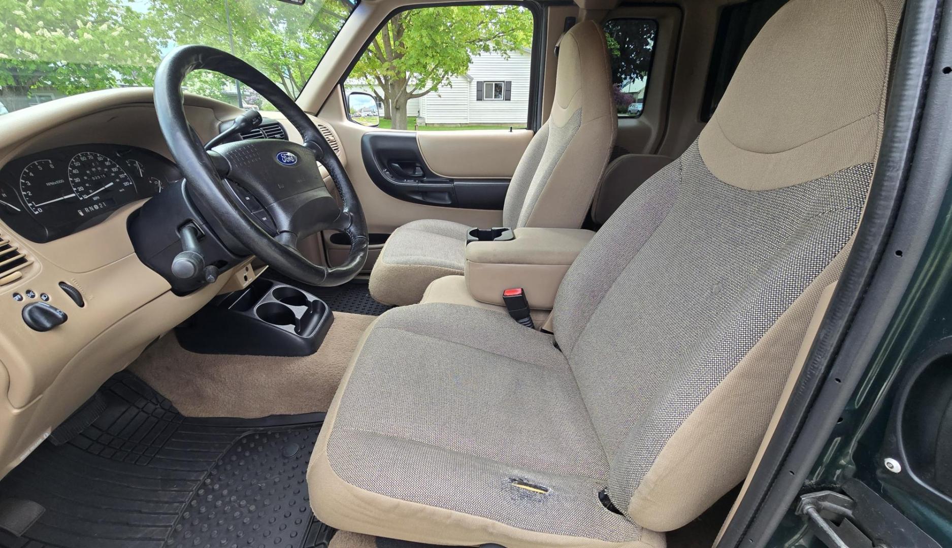 2002 Green /Black Ford Ranger Edge Plus SuperCab 4WD (1FTZR45E92P) with an 4.0L V6 SOHC 12V engine, 5-Speed Automatic Overdrive transmission, located at 450 N Russell, Missoula, MT, 59801, (406) 543-6600, 46.874496, -114.017433 - Hard to come by smaller 4WD Truck. 4.0L V6 Engine. Automatic Transmission. Nice Matching Topper. Air. Cruise. Tilt. Power Windows and Locks. AM FM CD Player. Towing. Running Board. Engine is Strong and Body is Straight. Paint has a few blemishes. Because of the age, financing is not available th - Photo#12