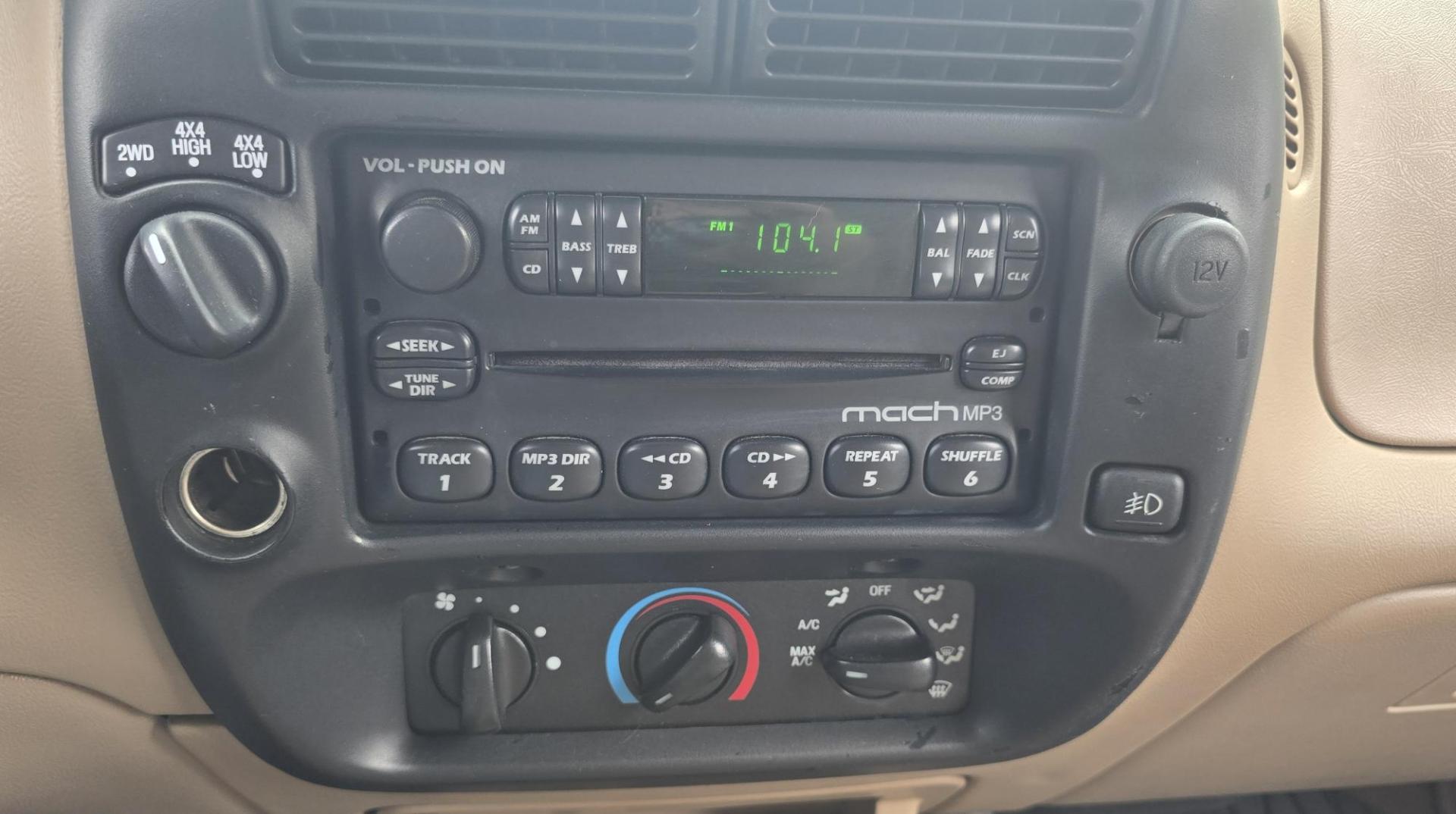 2002 Green /Black Ford Ranger Edge Plus SuperCab 4WD (1FTZR45E92P) with an 4.0L V6 SOHC 12V engine, 5-Speed Automatic Overdrive transmission, located at 450 N Russell, Missoula, MT, 59801, (406) 543-6600, 46.874496, -114.017433 - Hard to come by smaller 4WD Truck. 4.0L V6 Engine. Automatic Transmission. Nice Matching Topper. Air. Cruise. Tilt. Power Windows and Locks. AM FM CD Player. Towing. Running Board. Engine is Strong and Body is Straight. Paint has a few blemishes. Because of the age, financing is not available th - Photo#15