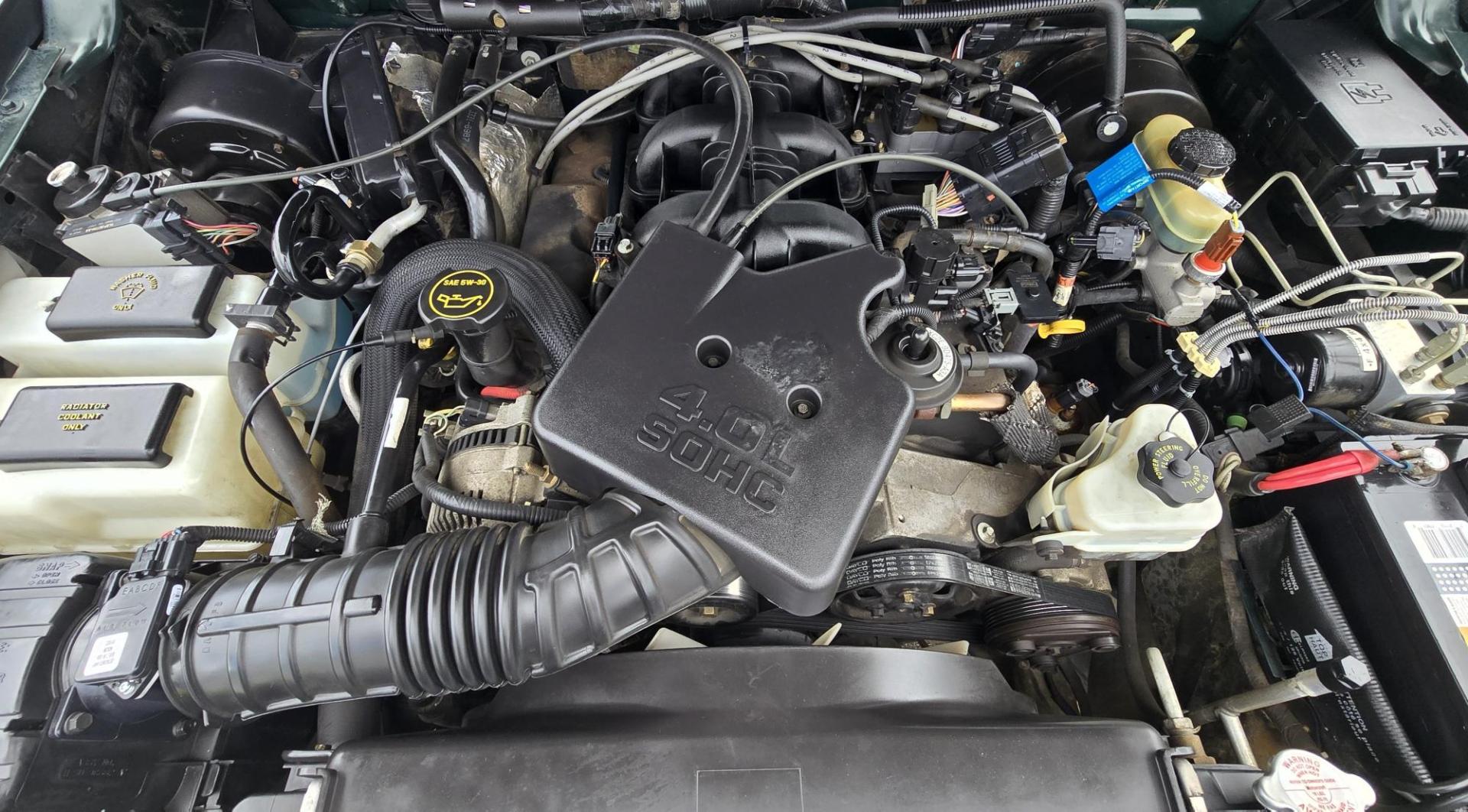 2002 Green /Black Ford Ranger Edge Plus SuperCab 4WD (1FTZR45E92P) with an 4.0L V6 SOHC 12V engine, 5-Speed Automatic Overdrive transmission, located at 450 N Russell, Missoula, MT, 59801, (406) 543-6600, 46.874496, -114.017433 - Hard to come by smaller 4WD Truck. 4.0L V6 Engine. Automatic Transmission. Nice Matching Topper. Air. Cruise. Tilt. Power Windows and Locks. AM FM CD Player. Towing. Running Board. Engine is Strong and Body is Straight. Paint has a few blemishes. Because of the age, financing is not available th - Photo#18