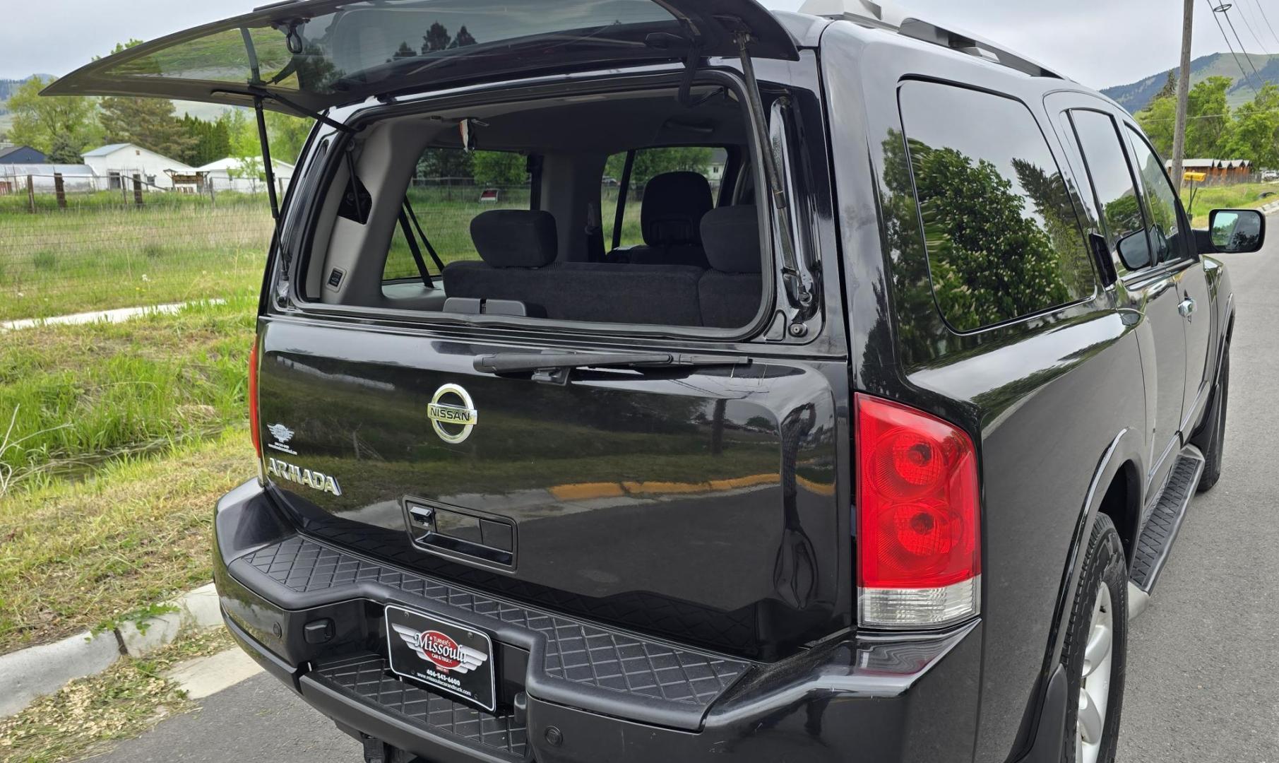 2014 Black /Black Nissan Armada SL 4WD (5N1AA0NC2EN) with an 5.6L V8 DOHC 32V engine, 5-Speed Automatic transmission, located at 450 N Russell, Missoula, MT, 59801, (406) 543-6600, 46.874496, -114.017433 - Clean 4WD SUV. 5.6L V8 Engine. Automatic Transmission. Front and Rear Air Conditioning. Leather Heated Seats. 3rd Row Seating. AM FM XM CD Player. Bluetooth Audio and Phone. Power Rear Hatch, Running Boards. The Vehicle was in an accident in 2020. The Insurance Company deemed it a total loss. Th - Photo#10