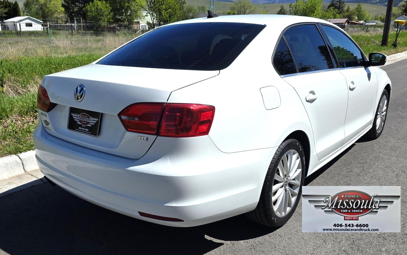 2014 White /Black Volkswagen Jetta TDI (3VWLL7AJ9EM) with an 2.0L L4 DOHC 16V DIESEL TURBO engine, Automatic transmission, located at 450 N Russell, Missoula, MT, 59801, (406) 543-6600, 46.874496, -114.017433 - Nice VW Diesel Sedan. FWD. 2.0L TDI Engine. Automatic Transmission. Leather Heated Seats. Power Sunroof. Power Windows and Locks. AM FM CD Fender Stereo System. Bluetooth Audio and Phone. Backup Camera. Great Fuel Economy. Clean Title and Carfax. - Photo#6