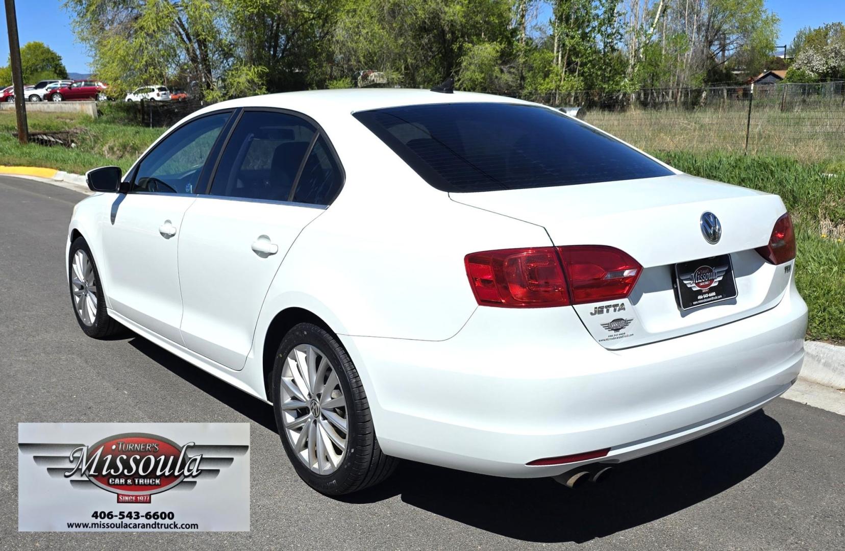 2014 White /Black Volkswagen Jetta TDI (3VWLL7AJ9EM) with an 2.0L L4 DOHC 16V DIESEL TURBO engine, Automatic transmission, located at 450 N Russell, Missoula, MT, 59801, (406) 543-6600, 46.874496, -114.017433 - Nice VW Diesel Sedan. FWD. 2.0L TDI Engine. Automatic Transmission. Leather Heated Seats. Power Sunroof. Power Windows and Locks. AM FM CD Fender Stereo System. Bluetooth Audio and Phone. Backup Camera. Great Fuel Economy. Clean Title and Carfax. - Photo#5