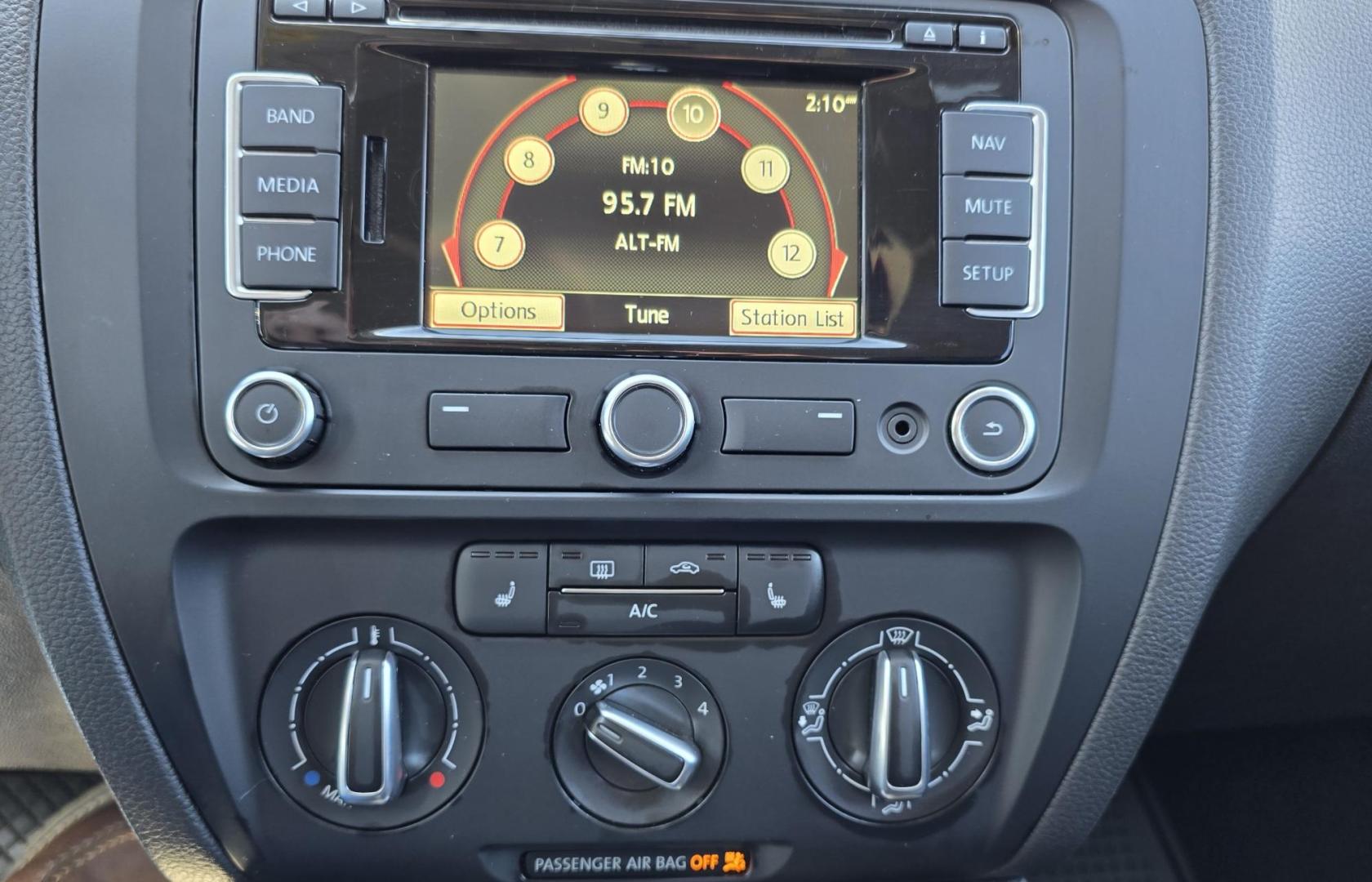 2014 White /Black Volkswagen Jetta TDI (3VWLL7AJ9EM) with an 2.0L L4 DOHC 16V DIESEL TURBO engine, Automatic transmission, located at 450 N Russell, Missoula, MT, 59801, (406) 543-6600, 46.874496, -114.017433 - Nice VW Diesel Sedan. FWD. 2.0L TDI Engine. Automatic Transmission. Leather Heated Seats. Power Sunroof. Power Windows and Locks. AM FM CD Fender Stereo System. Bluetooth Audio and Phone. Backup Camera. Great Fuel Economy. Clean Title and Carfax. - Photo#10