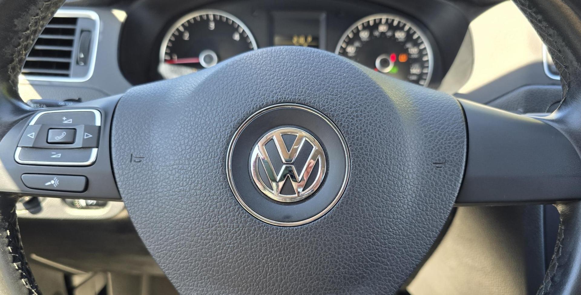 2014 White /Black Volkswagen Jetta TDI (3VWLL7AJ9EM) with an 2.0L L4 DOHC 16V DIESEL TURBO engine, Automatic transmission, located at 450 N Russell, Missoula, MT, 59801, (406) 543-6600, 46.874496, -114.017433 - Nice VW Diesel Sedan. FWD. 2.0L TDI Engine. Automatic Transmission. Leather Heated Seats. Power Sunroof. Power Windows and Locks. AM FM CD Fender Stereo System. Bluetooth Audio and Phone. Backup Camera. Great Fuel Economy. Clean Title and Carfax. - Photo#11