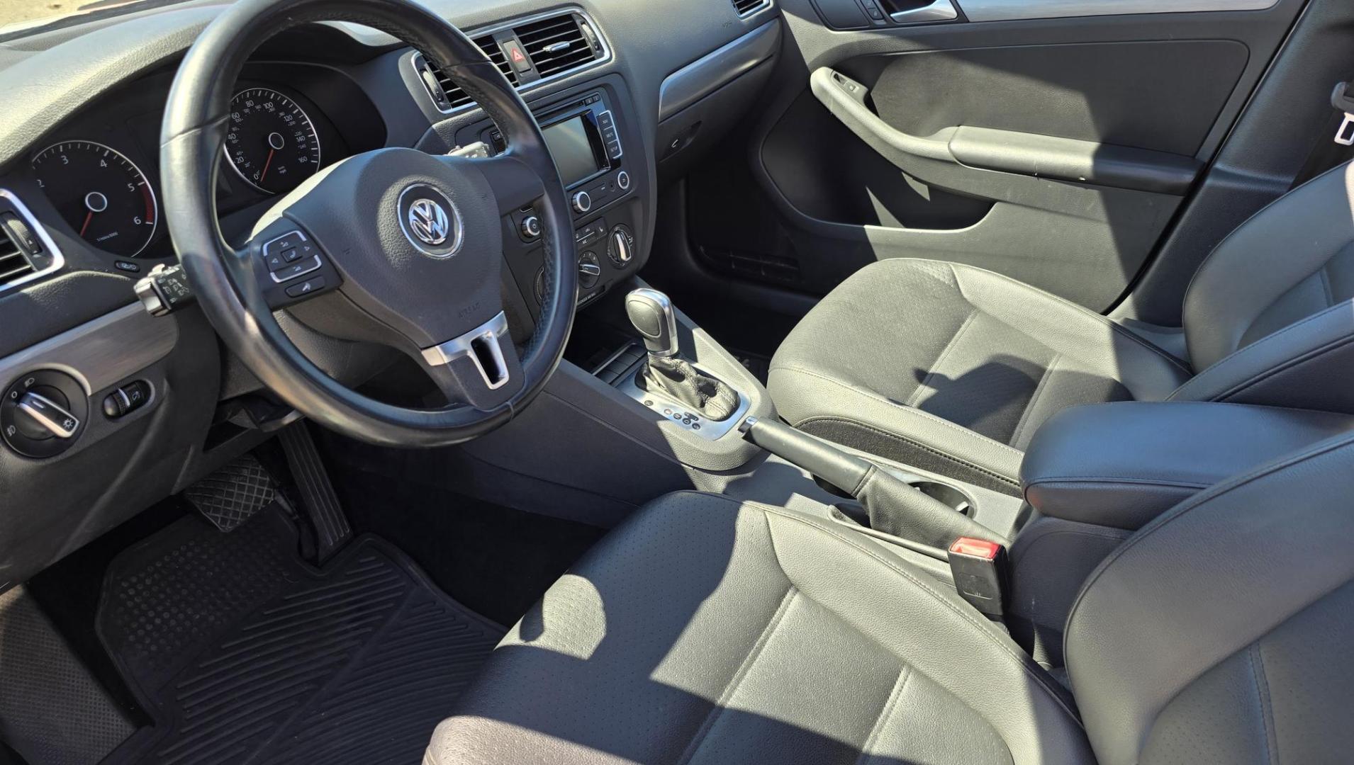 2014 White /Black Volkswagen Jetta TDI (3VWLL7AJ9EM) with an 2.0L L4 DOHC 16V DIESEL TURBO engine, Automatic transmission, located at 450 N Russell, Missoula, MT, 59801, (406) 543-6600, 46.874496, -114.017433 - Nice VW Diesel Sedan. FWD. 2.0L TDI Engine. Automatic Transmission. Leather Heated Seats. Power Sunroof. Power Windows and Locks. AM FM CD Fender Stereo System. Bluetooth Audio and Phone. Backup Camera. Great Fuel Economy. Clean Title and Carfax. - Photo#13