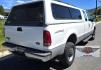 1999 White /Gray Ford F-250 SD Lariat SuperCab LWB 4WD (1FTNX21S9XE) with an 6.8L V10 SOHC 20V engine, Automatic transmission, located at 450 N Russell, Missoula, MT, 59801, (406) 543-6600, 46.874496, -114.017433 - Nice Owner Owner Truck with a Clean Carfax. Only 120,700 Miles. Powerful, Reliable V10 Engine. Automatic Transmission. 4WD with Locking Hubs. Long Box with Matching Topper. Power Drivers Seat. Air. Cruise. Tilt. Power Windows and Locks. AM FM Cassette CD Player. CB Radio. Because of the age, or L - Photo#4