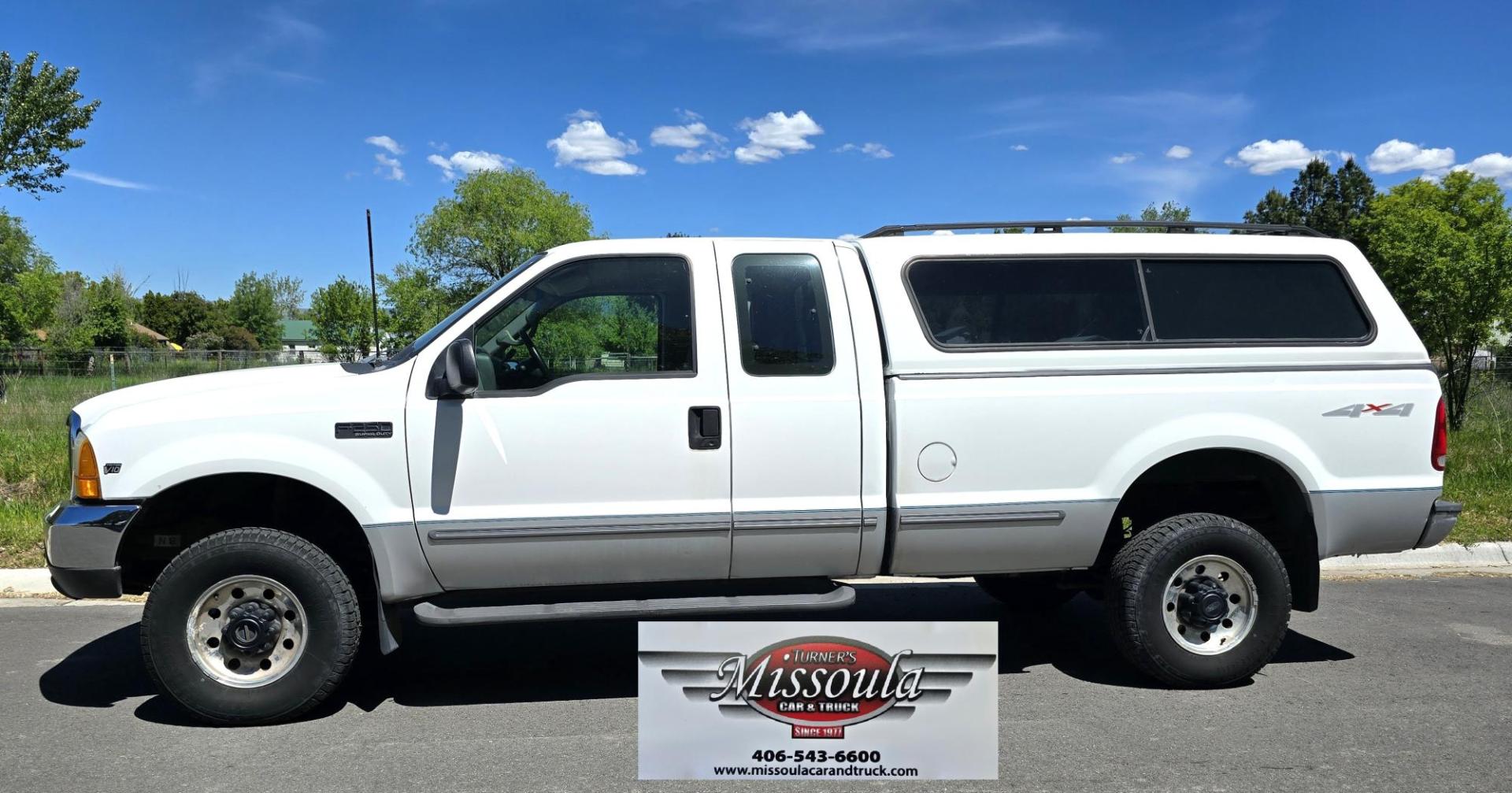 1999 White /Gray Ford F-250 SD Lariat SuperCab LWB 4WD (1FTNX21S9XE) with an 6.8L V10 SOHC 20V engine, Automatic transmission, located at 450 N Russell, Missoula, MT, 59801, (406) 543-6600, 46.874496, -114.017433 - Nice Owner Owner Truck with a Clean Carfax. Only 120,700 Miles. Powerful, Reliable V10 Engine. Automatic Transmission. 4WD with Locking Hubs. Long Box with Matching Topper. Power Drivers Seat. Air. Cruise. Tilt. Power Windows and Locks. AM FM Cassette CD Player. CB Radio. Because of the age, or L - Photo#5