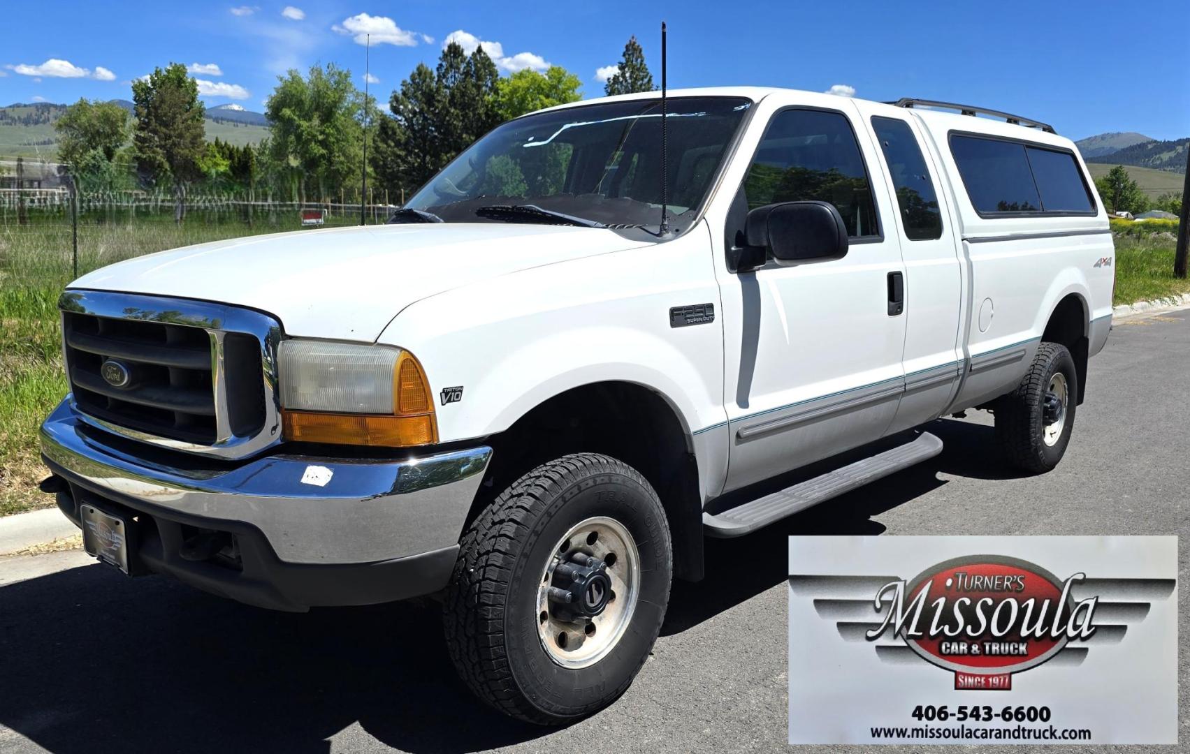 1999 White /Gray Ford F-250 SD Lariat SuperCab LWB 4WD (1FTNX21S9XE) with an 6.8L V10 SOHC 20V engine, Automatic transmission, located at 450 N Russell, Missoula, MT, 59801, (406) 543-6600, 46.874496, -114.017433 - Nice Owner Owner Truck with a Clean Carfax. Only 120,700 Miles. Powerful, Reliable V10 Engine. Automatic Transmission. 4WD with Locking Hubs. Long Box with Matching Topper. Power Drivers Seat. Air. Cruise. Tilt. Power Windows and Locks. AM FM Cassette CD Player. CB Radio. Because of the age, or L - Photo#6