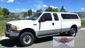 1999 White /Gray Ford F-250 SD Lariat SuperCab LWB 4WD (1FTNX21S9XE) with an 6.8L V10 SOHC 20V engine, Automatic transmission, located at 450 N Russell, Missoula, MT, 59801, (406) 543-6600, 46.874496, -114.017433 - Nice Owner Owner Truck with a Clean Carfax. Only 120,700 Miles. Powerful, Reliable V10 Engine. Automatic Transmission. 4WD with Locking Hubs. Long Box with Matching Topper. Power Drivers Seat. Air. Cruise. Tilt. Power Windows and Locks. AM FM Cassette CD Player. CB Radio. Because of the age, or L - Photo#7