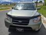 2009 Green /Tan Hyundai Santa Fe LE (5NMSH13E69H) with an 3.3L V6 DOHC 24V engine, 5-Speed Automatic transmission, located at 450 N Russell, Missoula, MT, 59801, (406) 543-6600, 46.874496, -114.017433 - Clean FWD SUV. 3.3L V6 Engine. Automatic Transmission. Air Cruise Tilt. Power Windows and Locks. 2 Owner with a Clean Title and Carfax. - Photo#2