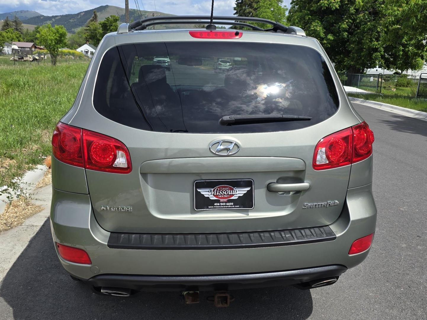 2009 Green /Tan Hyundai Santa Fe LE (5NMSH13E69H) with an 3.3L V6 DOHC 24V engine, 5-Speed Automatic transmission, located at 450 N Russell, Missoula, MT, 59801, (406) 543-6600, 46.874496, -114.017433 - Clean FWD SUV. 3.3L V6 Engine. Automatic Transmission. Air Cruise Tilt. Power Windows and Locks. 2 Owner with a Clean Title and Carfax. - Photo#4
