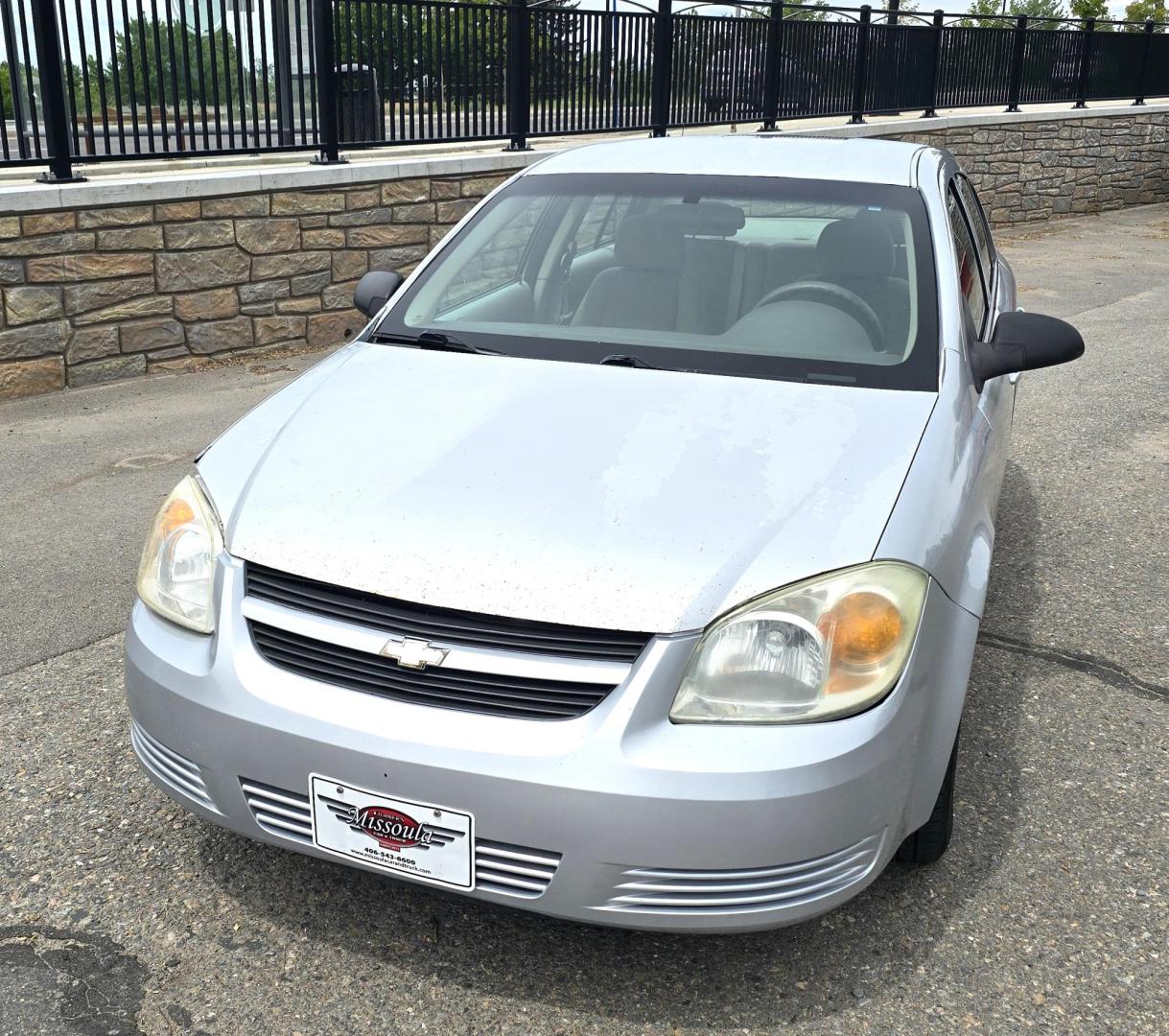 2007 Silver /Gray Chevrolet Cobalt LS Sedan (1G1AK55F577) with an 2.2L L4 DOHC 16V engine, Automatic transmission, located at 450 N Russell, Missoula, MT, 59801, (406) 543-6600, 46.874496, -114.017433 - Great Running Economy Sedan at a reasonable price. 2.2L I4 Engine. Automatic Transmission. Air Conditioning. Tilt Steering. Like New Toyo Tires. Does have a dent in the right front. Has a Branded Title because of a Mileage Discrepancy. - Photo#3