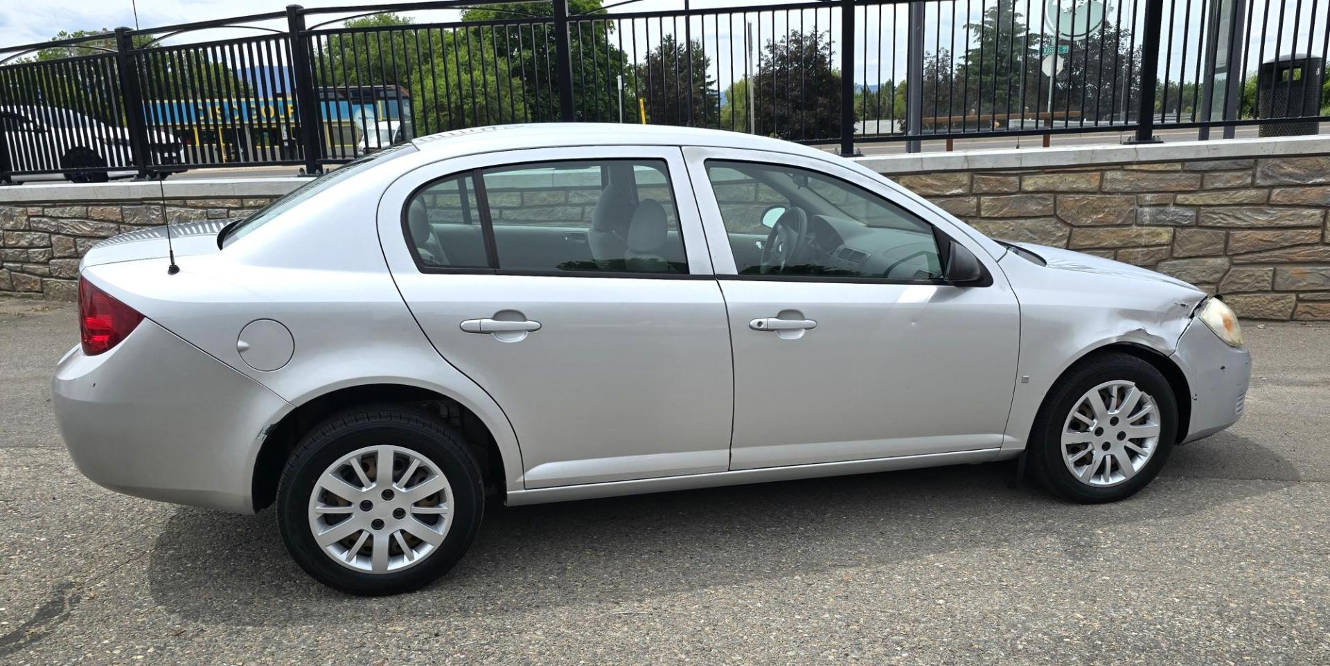 2007 Silver /Gray Chevrolet Cobalt LS Sedan (1G1AK55F577) with an 2.2L L4 DOHC 16V engine, Automatic transmission, located at 450 N Russell, Missoula, MT, 59801, (406) 543-6600, 46.874496, -114.017433 - Great Running Economy Sedan at a reasonable price. 2.2L I4 Engine. Automatic Transmission. Air Conditioning. Tilt Steering. Like New Toyo Tires. Does have a dent in the right front. Has a Branded Title because of a Mileage Discrepancy. - Photo#8