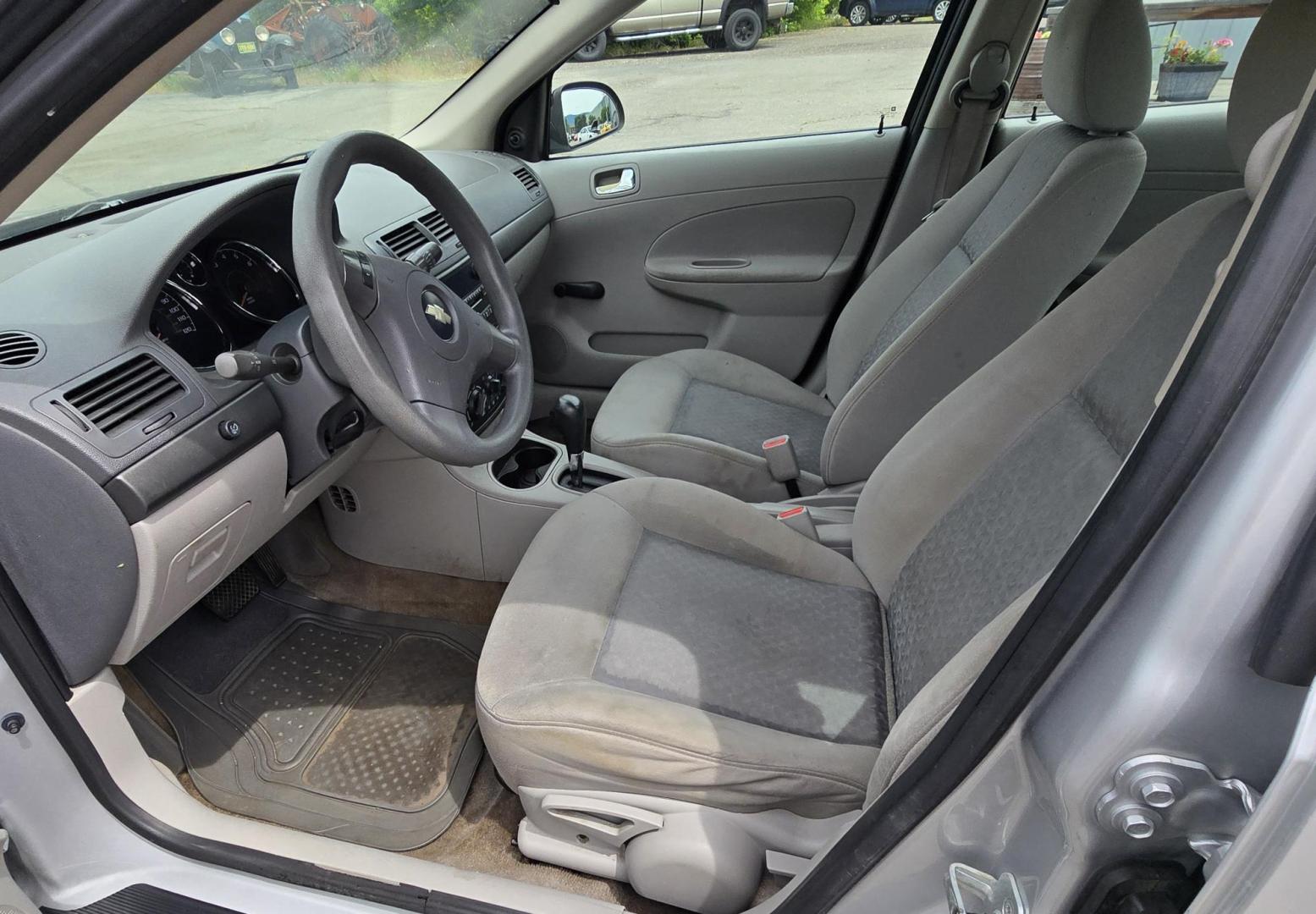 2007 Silver /Gray Chevrolet Cobalt LS Sedan (1G1AK55F577) with an 2.2L L4 DOHC 16V engine, Automatic transmission, located at 450 N Russell, Missoula, MT, 59801, (406) 543-6600, 46.874496, -114.017433 - Great Running Economy Sedan at a reasonable price. 2.2L I4 Engine. Automatic Transmission. Air Conditioning. Tilt Steering. Like New Toyo Tires. Does have a dent in the right front. Has a Branded Title because of a Mileage Discrepancy. - Photo#14