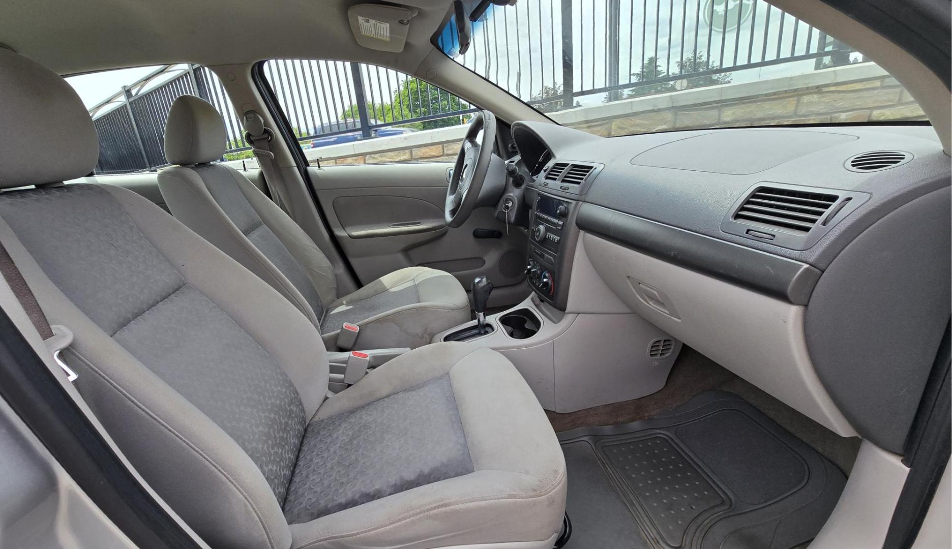2007 Silver /Gray Chevrolet Cobalt LS Sedan (1G1AK55F577) with an 2.2L L4 DOHC 16V engine, Automatic transmission, located at 450 N Russell, Missoula, MT, 59801, (406) 543-6600, 46.874496, -114.017433 - Great Running Economy Sedan at a reasonable price. 2.2L I4 Engine. Automatic Transmission. Air Conditioning. Tilt Steering. Like New Toyo Tires. Does have a dent in the right front. Has a Branded Title because of a Mileage Discrepancy. - Photo#12