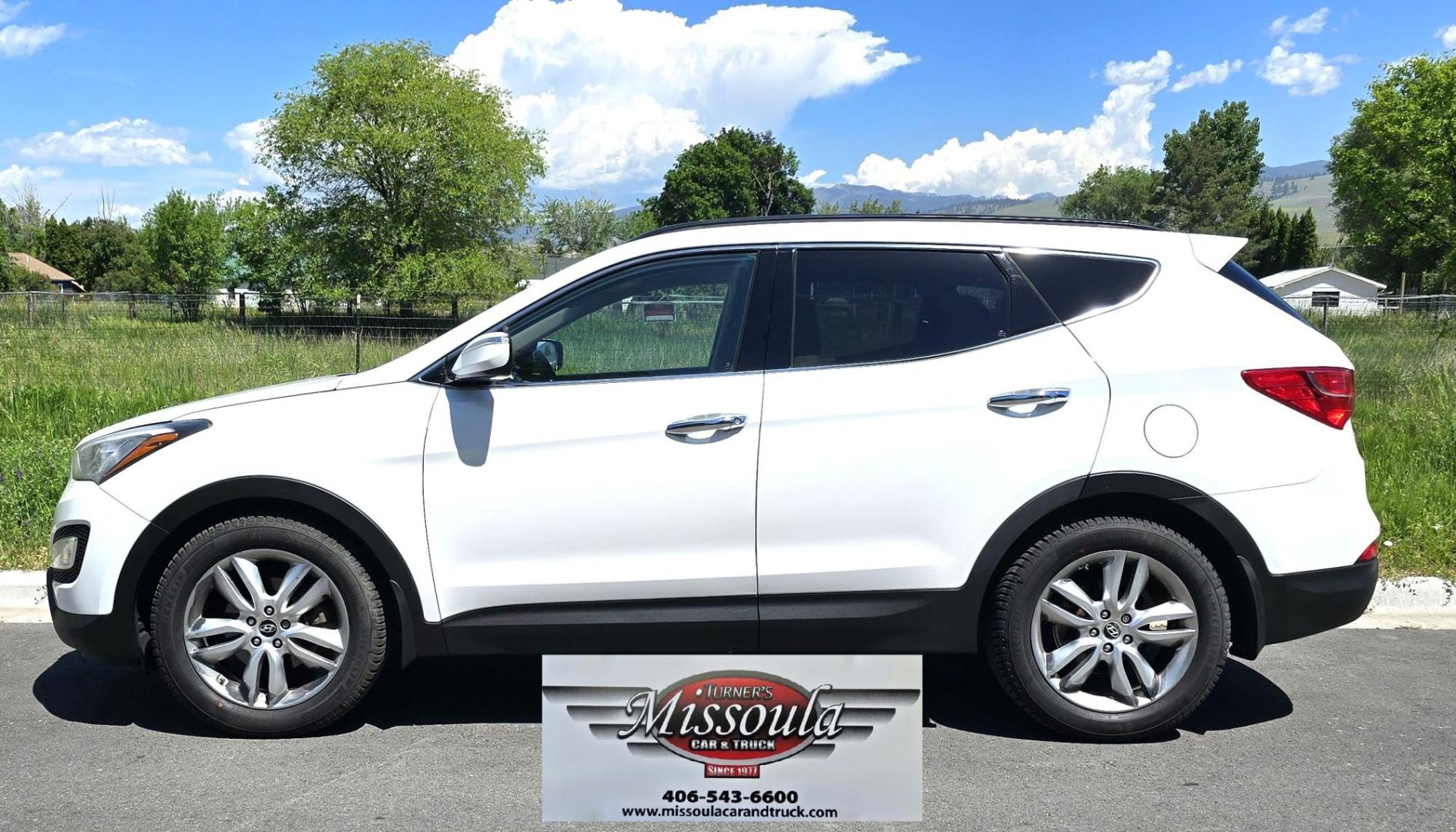 2013 White /Gray Hyundai Santa Fe Sport 2.0 AWD (5XYZUDLAXDG) with an 2.0L L4 DOHC 16V engine, 6-Speed Automatic transmission, located at 450 N Russell, Missoula, MT, 59801, (406) 543-6600, 46.874496, -114.017433 - Clean AWD SUV. 2.0L I4 Engine. Air. Cruise. Tilt. Bluetooth Audio and Phone. Power Drivers Seat. Heated Front Seats. - Photo#4