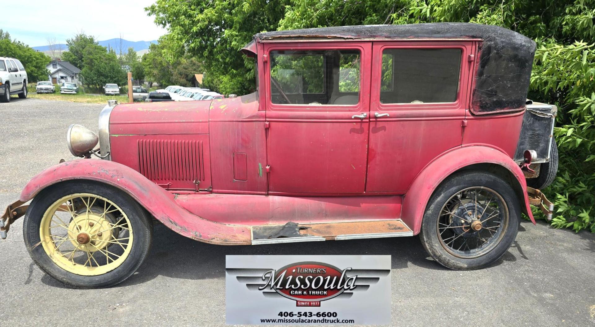 1928 Red /Tan Ford Model A with an Flathead 4 engine, manual transmission, located at 450 N Russell, Missoula, MT, 59801, (406) 543-6600, 46.874496, -114.017433 - Great Project to Restore or make a Cool Ratrod. Flathead Engine that was running as of 5 years ago. I'm sure the system will need to be cleaned out before running again. Selling AS IS for Parts or Restoration. Glass is Good. Body is overall good with a dent in the left rear fender. Interior is mostl - Photo#1