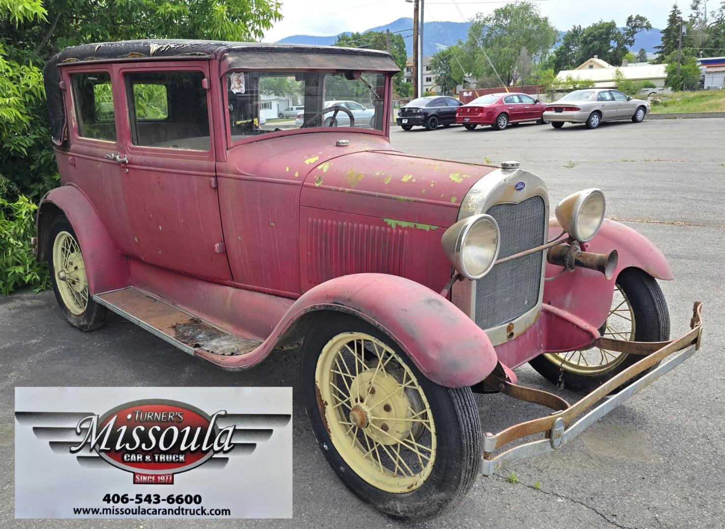 1928 Red /Tan Ford Model A with an Flathead 4 engine, manual transmission, located at 450 N Russell, Missoula, MT, 59801, (406) 543-6600, 46.874496, -114.017433 - Great Project to Restore or make a Cool Ratrod. Flathead Engine that was running as of 5 years ago. I'm sure the system will need to be cleaned out before running again. Selling AS IS for Parts or Restoration. Glass is Good. Body is overall good with a dent in the left rear fender. Interior is mostl - Photo#4
