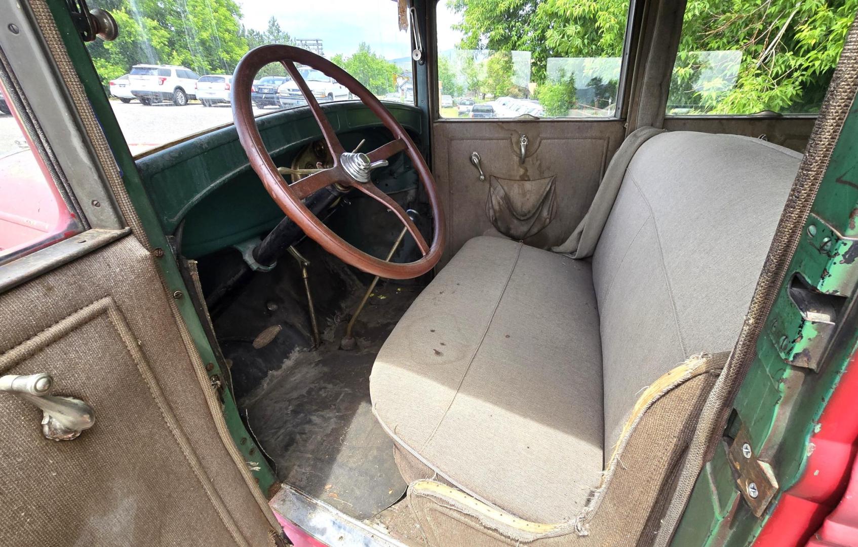 1928 Red /Tan Ford Model A with an Flathead 4 engine, manual transmission, located at 450 N Russell, Missoula, MT, 59801, (406) 543-6600, 46.874496, -114.017433 - Great Project to Restore or make a Cool Ratrod. Flathead Engine that was running as of 5 years ago. I'm sure the system will need to be cleaned out before running again. Selling AS IS for Parts or Restoration. Glass is Good. Body is overall good with a dent in the left rear fender. Interior is mostl - Photo#6