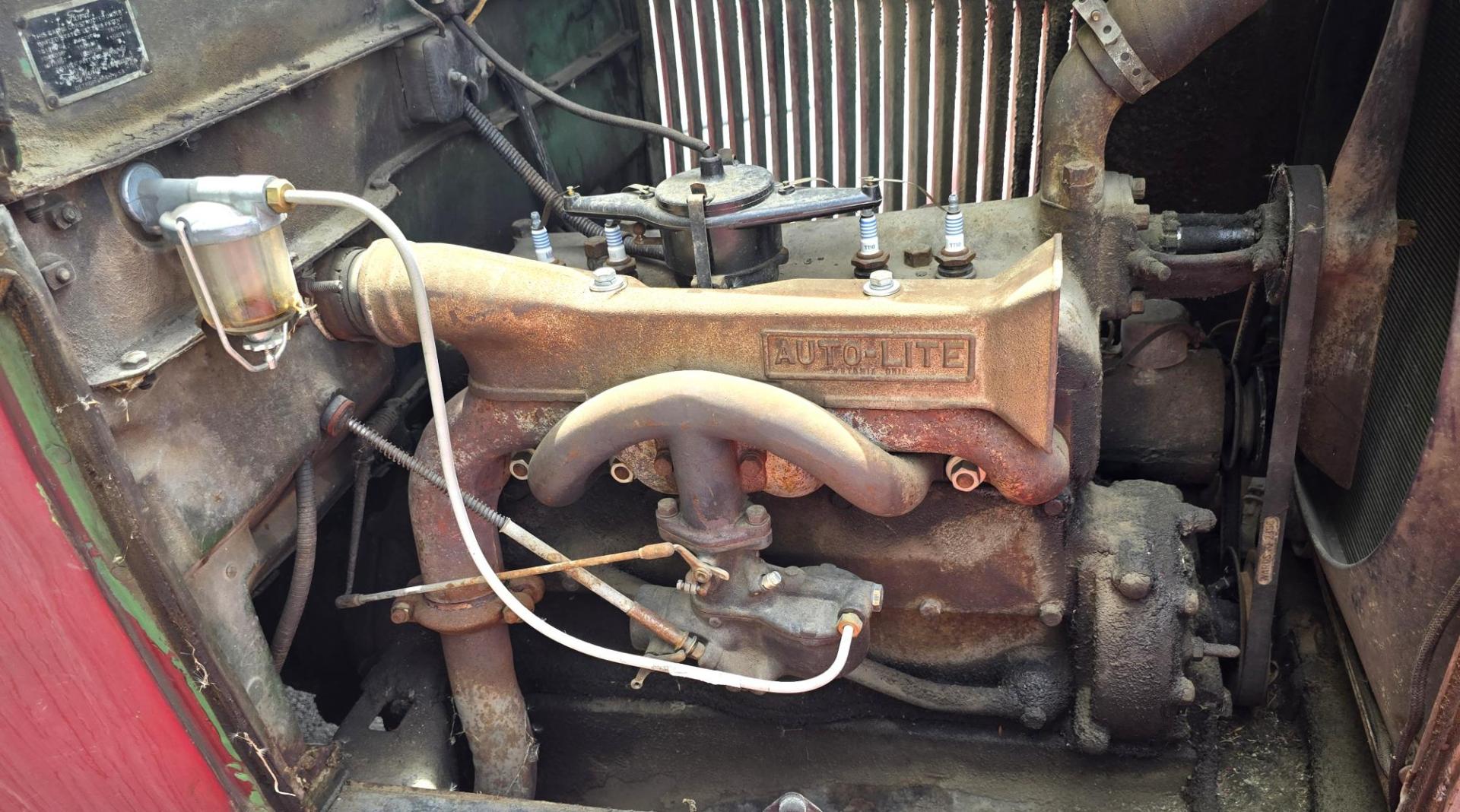 1928 Red /Tan Ford Model A with an Flathead 4 engine, manual transmission, located at 450 N Russell, Missoula, MT, 59801, (406) 543-6600, 46.874496, -114.017433 - Great Project to Restore or make a Cool Ratrod. Flathead Engine that was running as of 5 years ago. I'm sure the system will need to be cleaned out before running again. Selling AS IS for Parts or Restoration. Glass is Good. Body is overall good with a dent in the left rear fender. Interior is mostl - Photo#12