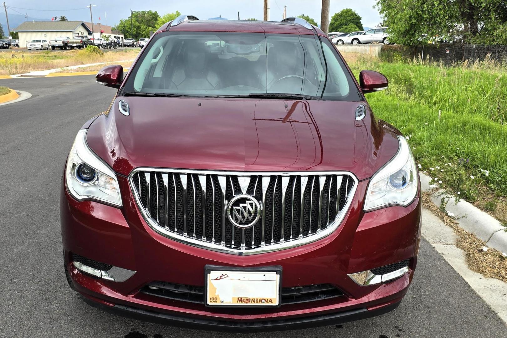 2016 Red /Black Buick Enclave Leather AWD (5GAKVBKD2GJ) with an 3.6L V6 DOHC 24V engine, 6-Speed Automatic Overdrive transmission, located at 450 N Russell, Missoula, MT, 59801, (406) 543-6600, 46.874496, -114.017433 - Beautiful Local Consignment. AWD SUV. Zippy 3.6L V6 Engine. 6 Speed Automatic Transmission. 3rd Row Seating. Two Sunroofs. Leather Seats. Power Front Seats. Heated Seats. Touch Screen. Blueooth Audio and Phone. AM FM SAT CD Player. Backup Camera. Air. Cruise. Tilt. Michelin Tires. Remote Start. - Photo#3