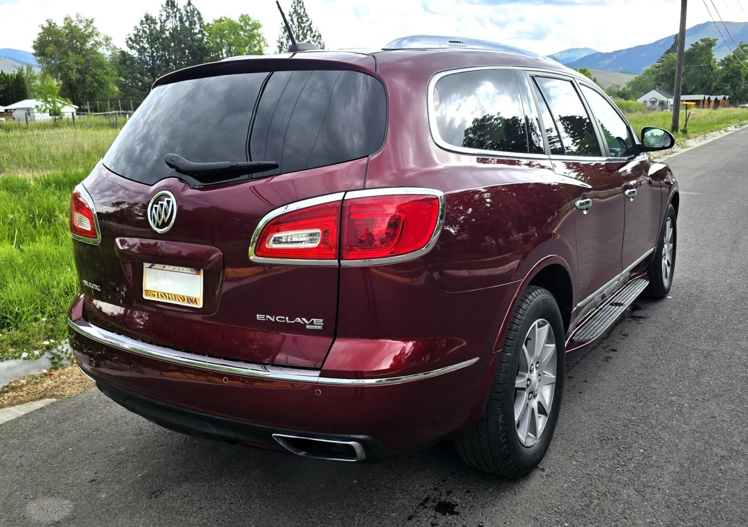 2016 Red /Black Buick Enclave Leather AWD (5GAKVBKD2GJ) with an 3.6L V6 DOHC 24V engine, 6-Speed Automatic Overdrive transmission, located at 450 N Russell, Missoula, MT, 59801, (406) 543-6600, 46.874496, -114.017433 - Beautiful Local Consignment. AWD SUV. Zippy 3.6L V6 Engine. 6 Speed Automatic Transmission. 3rd Row Seating. Two Sunroofs. Leather Seats. Power Front Seats. Heated Seats. Touch Screen. Blueooth Audio and Phone. AM FM SAT CD Player. Backup Camera. Air. Cruise. Tilt. Michelin Tires. Remote Start. - Photo#4