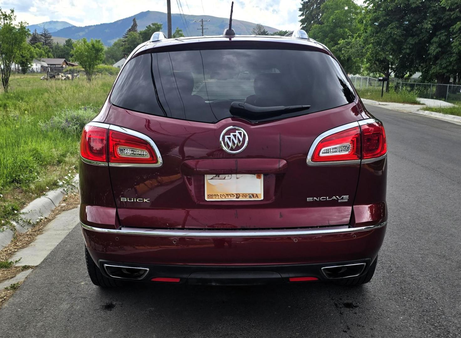 2016 Red /Black Buick Enclave Leather AWD (5GAKVBKD2GJ) with an 3.6L V6 DOHC 24V engine, 6-Speed Automatic Overdrive transmission, located at 450 N Russell, Missoula, MT, 59801, (406) 543-6600, 46.874496, -114.017433 - Beautiful Local Consignment. AWD SUV. Zippy 3.6L V6 Engine. 6 Speed Automatic Transmission. 3rd Row Seating. Two Sunroofs. Leather Seats. Power Front Seats. Heated Seats. Touch Screen. Blueooth Audio and Phone. AM FM SAT CD Player. Backup Camera. Air. Cruise. Tilt. Michelin Tires. Remote Start. - Photo#5