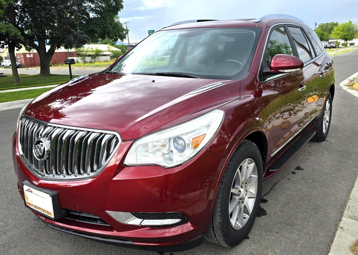 2016 Red /Black Buick Enclave Leather AWD (5GAKVBKD2GJ) with an 3.6L V6 DOHC 24V engine, 6-Speed Automatic Overdrive transmission, located at 450 N Russell, Missoula, MT, 59801, (406) 543-6600, 46.874496, -114.017433 - Beautiful Local Consignment. AWD SUV. Zippy 3.6L V6 Engine. 6 Speed Automatic Transmission. 3rd Row Seating. Two Sunroofs. Leather Seats. Power Front Seats. Heated Seats. Touch Screen. Blueooth Audio and Phone. AM FM SAT CD Player. Backup Camera. Air. Cruise. Tilt. Michelin Tires. Remote Start. - Photo#7