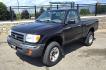 1999 Purple /Gray Toyota Tacoma Regular Cab 4WD (4TAPM62N7XZ) with an 2.7L L4 DOHC 16V engine, 5 Seed Manual transmission, located at 450 N Russell, Missoula, MT, 59801, (406) 543-6600, 46.874496, -114.017433 - Photo#1