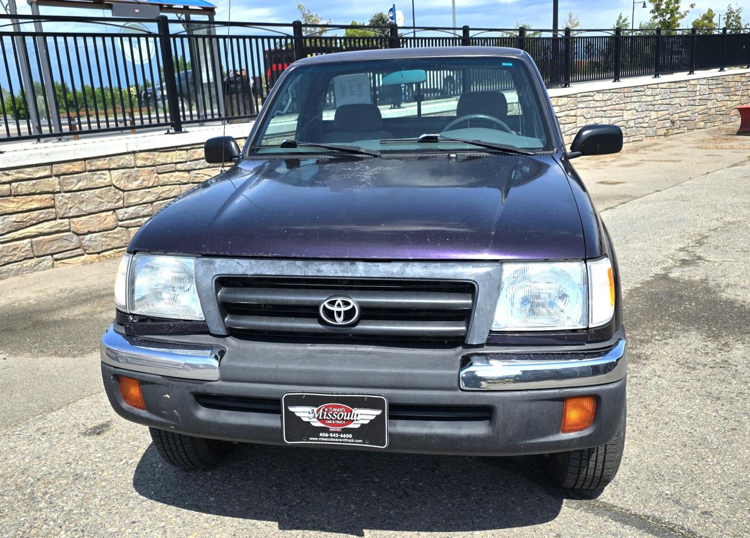 1999 Purple /Gray Toyota Tacoma Regular Cab 4WD (4TAPM62N7XZ) with an 2.7L L4 DOHC 16V engine, 5 Seed Manual transmission, located at 450 N Russell, Missoula, MT, 59801, (406) 543-6600, 46.874496, -114.017433 - Photo#3