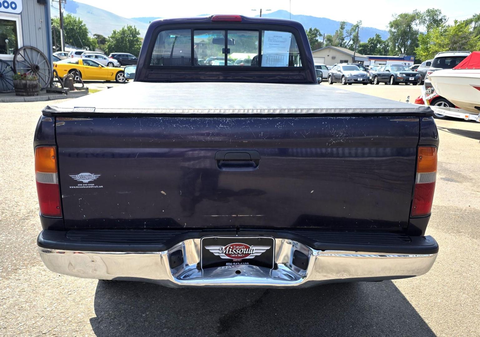 1999 Purple /Gray Toyota Tacoma Regular Cab 4WD (4TAPM62N7XZ) with an 2.7L L4 DOHC 16V engine, 5 Seed Manual transmission, located at 450 N Russell, Missoula, MT, 59801, (406) 543-6600, 46.874496, -114.017433 - Photo#5