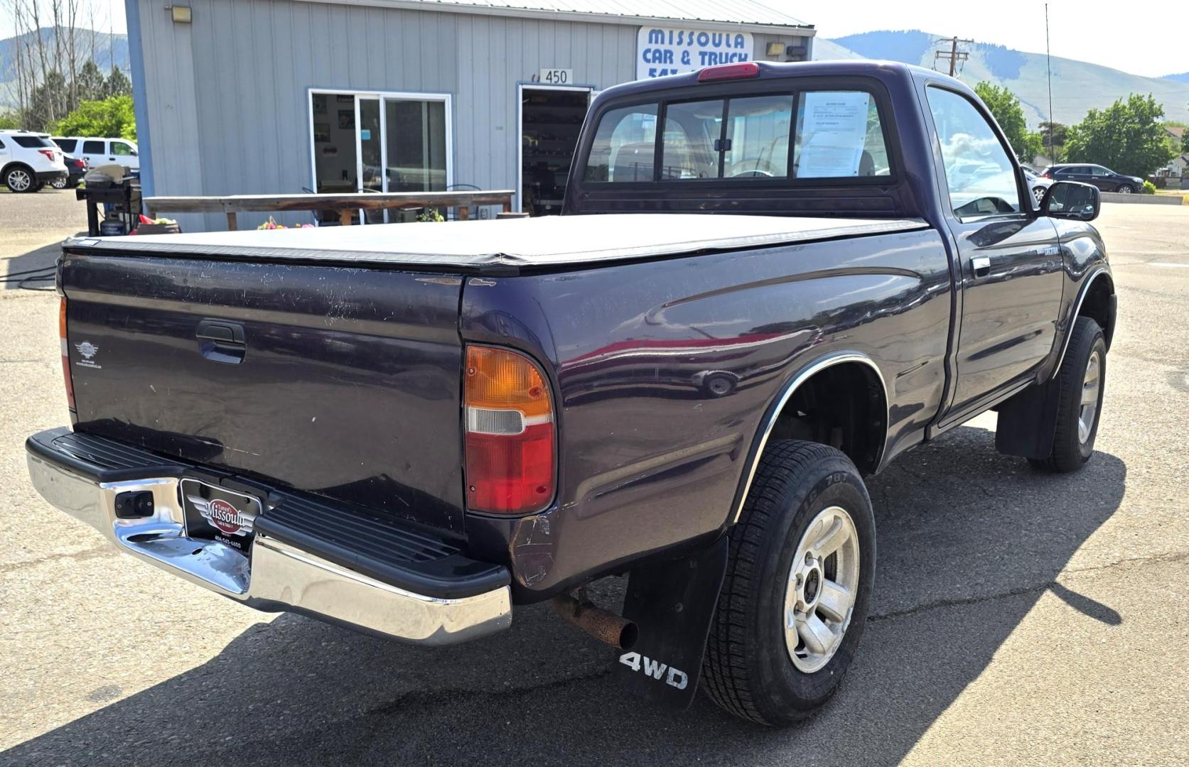 1999 Purple /Gray Toyota Tacoma Regular Cab 4WD (4TAPM62N7XZ) with an 2.7L L4 DOHC 16V engine, 5 Seed Manual transmission, located at 450 N Russell, Missoula, MT, 59801, (406) 543-6600, 46.874496, -114.017433 - Photo#6