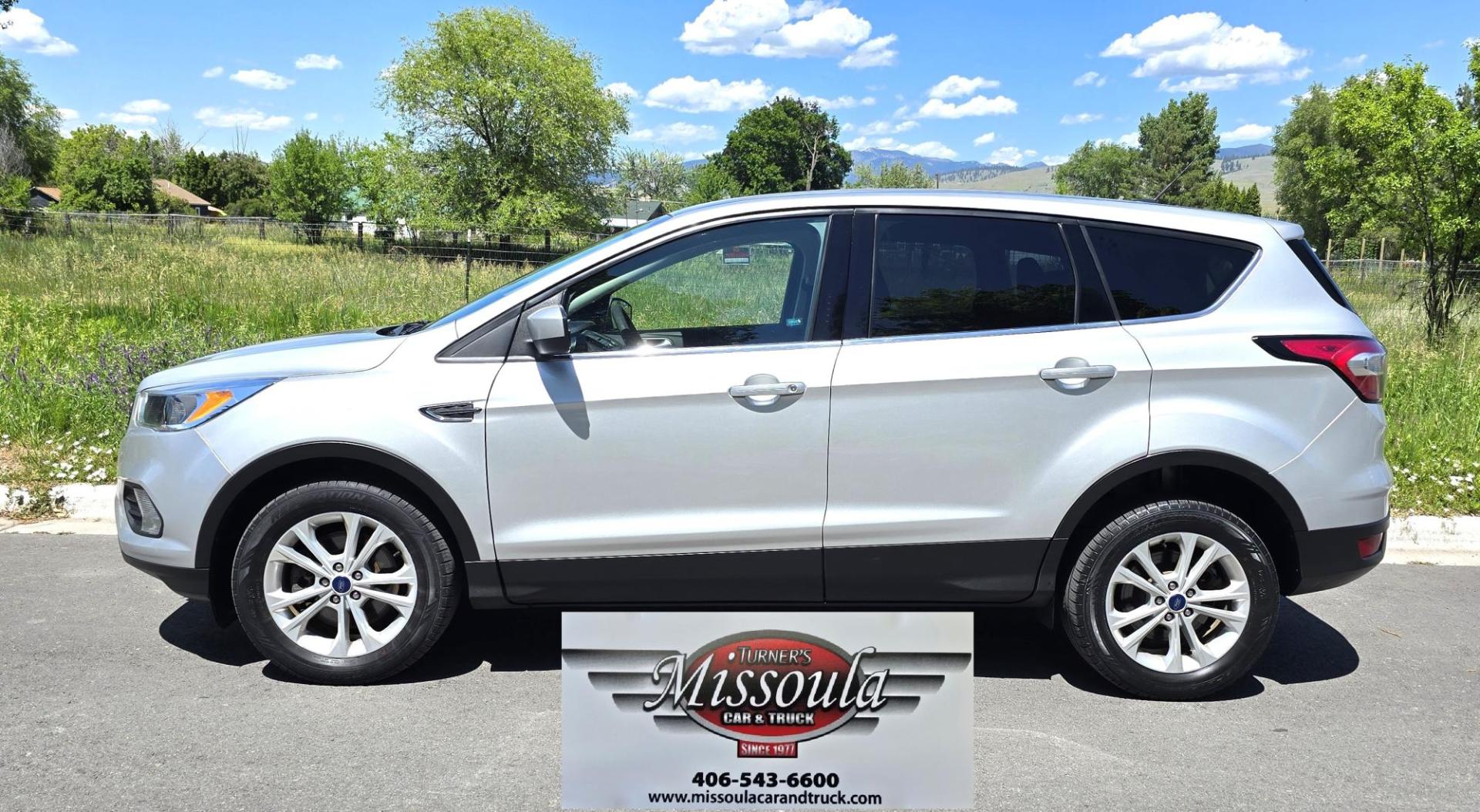 2017 Silver /Black Ford Escape SE 4WD (1FMCU9G91HU) with an 2.0L L4 DOHC 16V engine, 6A transmission, located at 450 N Russell, Missoula, MT, 59801, (406) 543-6600, 46.874496, -114.017433 - Hard to Find Good Economy AWD with only 70k Miles. 2.0L I4 Engine. Automatic Transmission. Air. Cruise. Tilt. Backup Camera. Bluetooth Audio and Phone. Power Drivers Seat. Like New All-Season Radials. - Photo#6