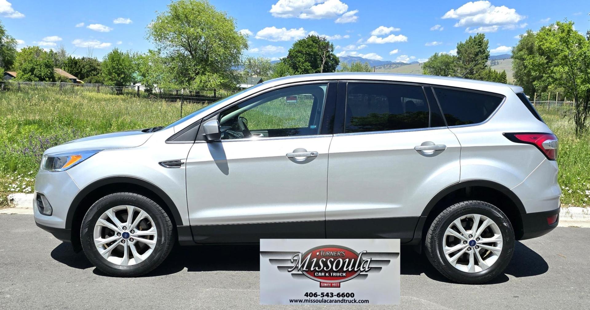 2017 Silver /Black Ford Escape SE 4WD (1FMCU9G91HU) with an 2.0L L4 DOHC 16V engine, 6A transmission, located at 450 N Russell, Missoula, MT, 59801, (406) 543-6600, 46.874496, -114.017433 - Hard to Find Good Economy AWD with only 70k Miles. 2.0L I4 Engine. Automatic Transmission. Air. Cruise. Tilt. Backup Camera. Bluetooth Audio and Phone. Power Drivers Seat. Like New All-Season Radials. - Photo#7