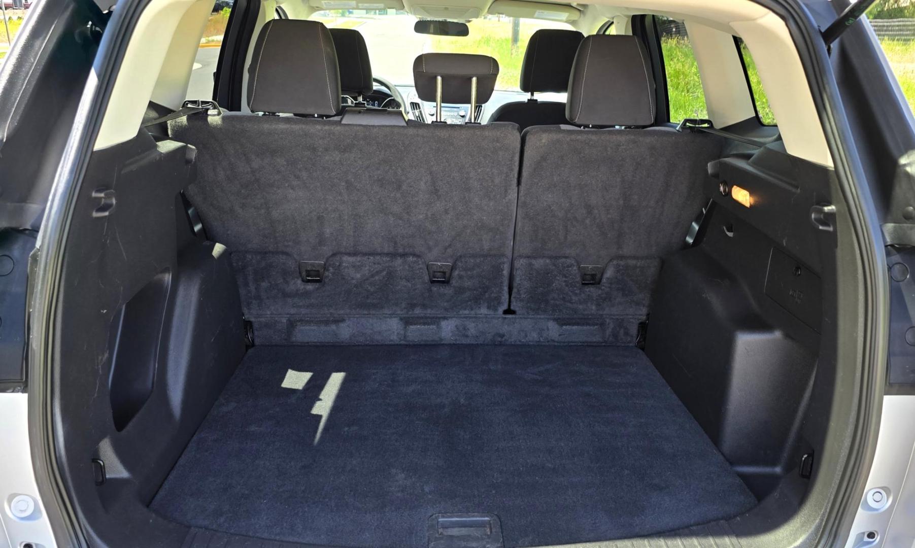 2017 Silver /Black Ford Escape SE 4WD (1FMCU9G91HU) with an 2.0L L4 DOHC 16V engine, 6A transmission, located at 450 N Russell, Missoula, MT, 59801, (406) 543-6600, 46.874496, -114.017433 - Hard to Find Good Economy AWD with only 70k Miles. 2.0L I4 Engine. Automatic Transmission. Air. Cruise. Tilt. Backup Camera. Bluetooth Audio and Phone. Power Drivers Seat. Like New All-Season Radials. - Photo#10
