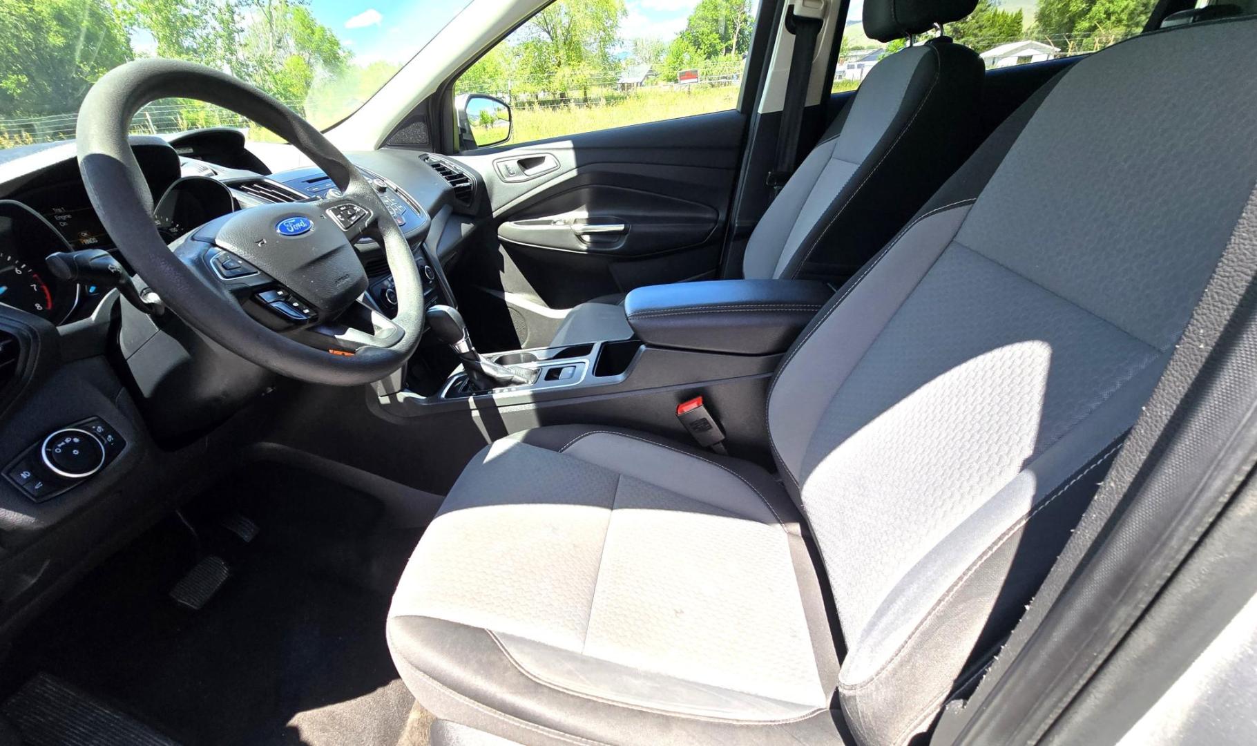 2017 Silver /Black Ford Escape SE 4WD (1FMCU9G91HU) with an 2.0L L4 DOHC 16V engine, 6A transmission, located at 450 N Russell, Missoula, MT, 59801, (406) 543-6600, 46.874496, -114.017433 - Hard to Find Good Economy AWD with only 70k Miles. 2.0L I4 Engine. Automatic Transmission. Air. Cruise. Tilt. Backup Camera. Bluetooth Audio and Phone. Power Drivers Seat. Like New All-Season Radials. - Photo#14