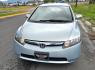 2006 Blue /Gray Honda Civic Hybrid CVT (JHMFA36256S) with an 1.3L L4 SOHC 8V HYBRID engine, Automatic CVT Overdrive transmission, located at 450 N Russell, Missoula, MT, 59801, (406) 543-6600, 46.874496, -114.017433 - Great Fuel Economy for a low price. 1.3L I4 Hybrid. Automatic Transmission. Air. Cruise. Tilt. Power Windows and Locks. It has a maintenance light on, but that's only because the reset button isn't working for days since last oil change. Has a couple dings and a crack in the rear bumper. Well below - Photo#2