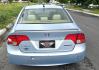 2006 Blue /Gray Honda Civic Hybrid CVT (JHMFA36256S) with an 1.3L L4 SOHC 8V HYBRID engine, Automatic CVT Overdrive transmission, located at 450 N Russell, Missoula, MT, 59801, (406) 543-6600, 46.874496, -114.017433 - Great Fuel Economy for a low price. 1.3L I4 Hybrid. Automatic Transmission. Air. Cruise. Tilt. Power Windows and Locks. It has a maintenance light on, but that's only because the reset button isn't working for days since last oil change. Has a couple dings and a crack in the rear bumper. Well below - Photo#6