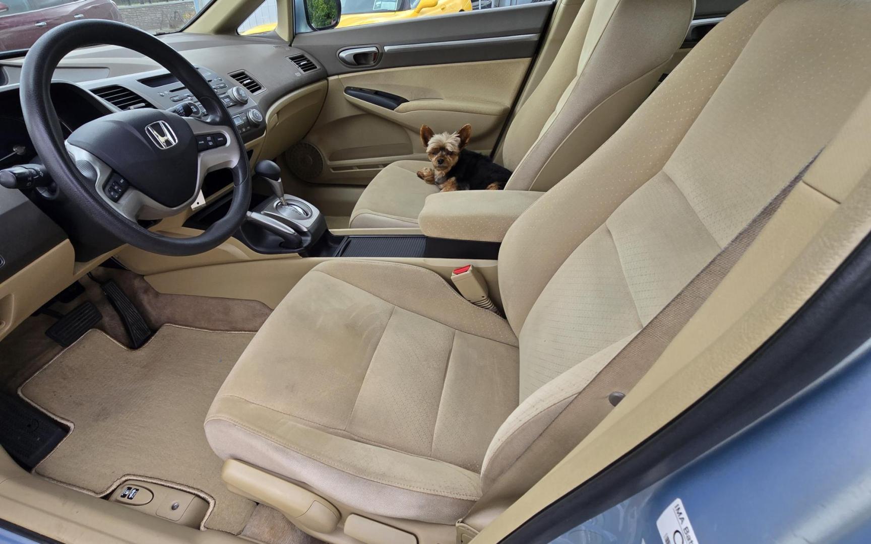 2006 Blue /Gray Honda Civic Hybrid CVT (JHMFA36256S) with an 1.3L L4 SOHC 8V HYBRID engine, Automatic CVT Overdrive transmission, located at 450 N Russell, Missoula, MT, 59801, (406) 543-6600, 46.874496, -114.017433 - Great Fuel Economy for a low price. 1.3L I4 Hybrid. Automatic Transmission. Air. Cruise. Tilt. Power Windows and Locks. It has a maintenance light on, but that's only because the reset button isn't working for days since last oil change. Has a couple dings and a crack in the rear bumper. Well below - Photo#12