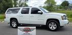 2009 White /Black Chevrolet Suburban LT1 1500 4WD (1GNFK26319R) with an 5.3L V8 OHV 16V FFV engine, 4-Speed Automatic transmission, located at 450 N Russell, Missoula, MT, 59801, (406) 543-6600, 46.874496, -114.017433 - Big Sexy 4WD SUV in Excellent Condition. 5.3L V8 Engine. 3rd Row Seating. Leather Seats. Heated Front and Middle Seats. Rear Entertainment. Power Sunroof. Power Liftgate. Front and Rear Climate Control. Towing. Running Boards. AM FM XM CD DVD and Navigation. Excellent Michelin Tires. We Finance - Photo#1