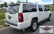 2009 White /Black Chevrolet Suburban LT1 1500 4WD (1GNFK26319R) with an 5.3L V8 OHV 16V FFV engine, 4-Speed Automatic transmission, located at 450 N Russell, Missoula, MT, 59801, (406) 543-6600, 46.874496, -114.017433 - Big Sexy 4WD SUV in Excellent Condition. 5.3L V8 Engine. 3rd Row Seating. Leather Seats. Heated Front and Middle Seats. Rear Entertainment. Power Sunroof. Power Liftgate. Front and Rear Climate Control. Towing. Running Boards. AM FM XM CD DVD and Navigation. Excellent Michelin Tires. We Finance - Photo#3