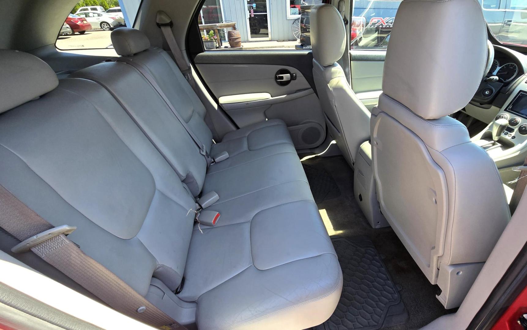 2006 Red /Tan Chevrolet Equinox LT AWD (2CNDL73F366) with an 3.4L V6 OHV 12V engine, 5-Speed Automatic transmission, located at 450 N Russell, Missoula, MT, 59801, (406) 543-6600, 46.874496, -114.017433 - Hard to a find Clean AWD SUV for this price.3.4L V6 Engine. Automatic Transmission. Power Sunroof. Power Windows and Locks. Power Drivers Seat. Air. Cruise. Tilt. Touchscreen Stereo with Bluetooth. We Finance through local Credit Unions. We do NOT offer In House (Buy Here Pay Here) Financing. - Photo#14