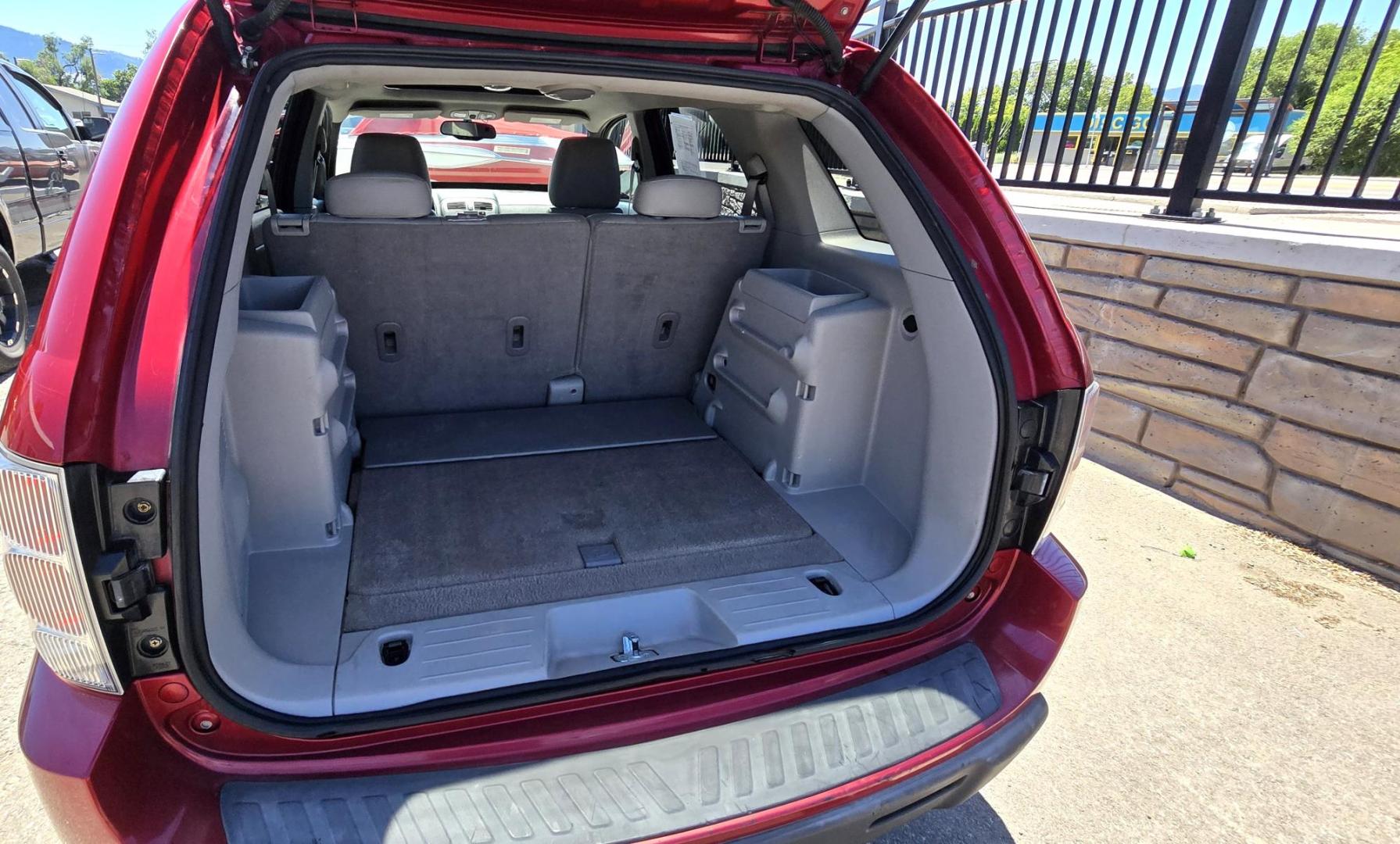 2006 Red /Tan Chevrolet Equinox LT AWD (2CNDL73F366) with an 3.4L V6 OHV 12V engine, 5-Speed Automatic transmission, located at 450 N Russell, Missoula, MT, 59801, (406) 543-6600, 46.874496, -114.017433 - Hard to a find Clean AWD SUV for this price.3.4L V6 Engine. Automatic Transmission. Power Sunroof. Power Windows and Locks. Power Drivers Seat. Air. Cruise. Tilt. Touchscreen Stereo with Bluetooth. We Finance through local Credit Unions. We do NOT offer In House (Buy Here Pay Here) Financing. - Photo#12