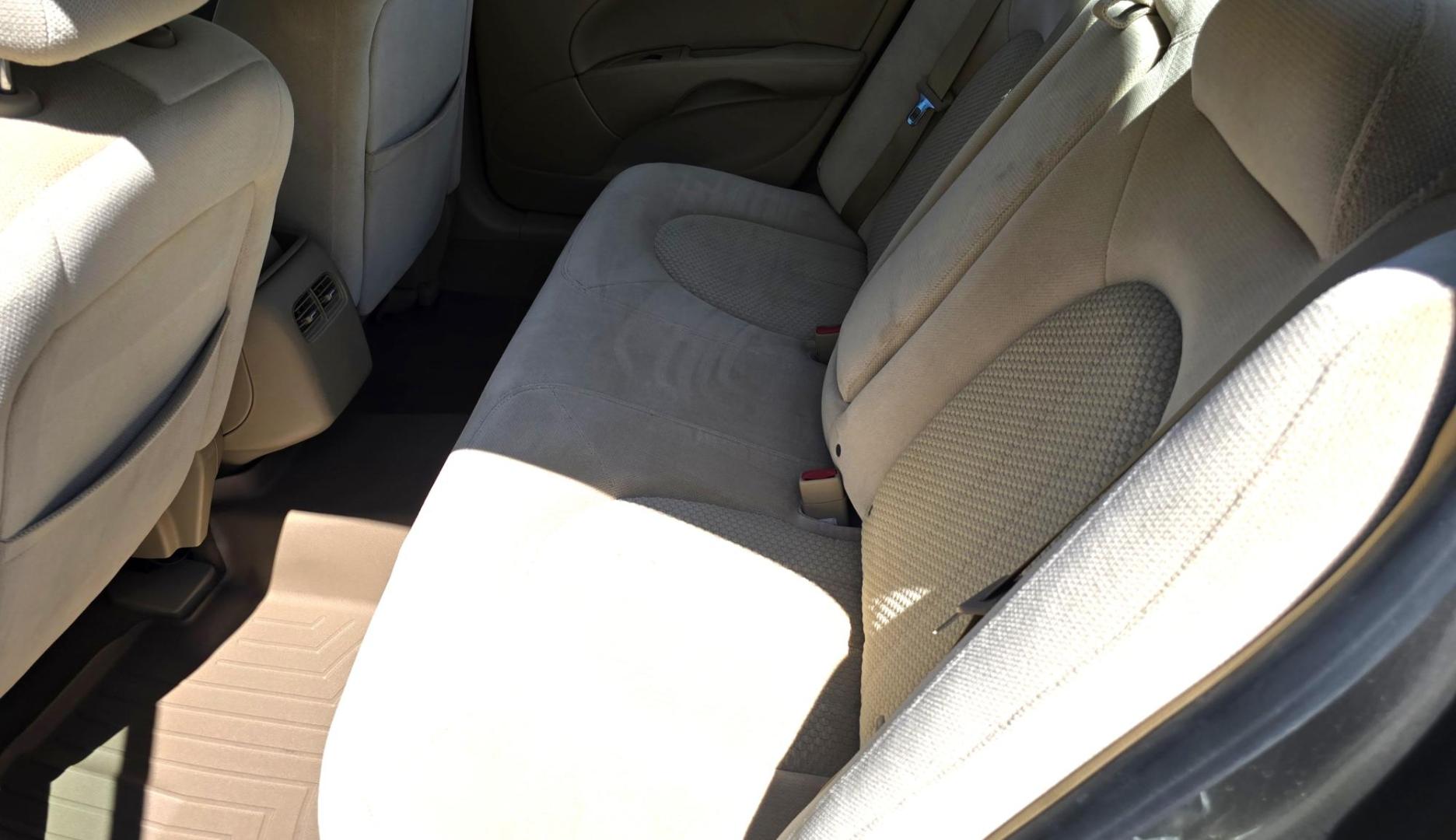2011 Brown /White Buick Lucerne CX (1G4HA5EM4BU) with an 3.9L V6 OHV 12V engine, 4-Speed Automatic transmission, located at 450 N Russell, Missoula, MT, 59801, (406) 543-6600, 46.874496, -114.017433 - Photo#13