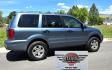 2005 Blue /Tan Honda Pilot EX-L w/ Leather (2HKYF18545H) with an 3.5L V6 SOHC 24V engine, 5-Speed Automatic Overdrive transmission, located at 450 N Russell, Missoula, MT, 59801, (406) 543-6600, 46.874496, -114.017433 - Photo#1