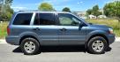 2005 Blue /Tan Honda Pilot EX-L w/ Leather (2HKYF18545H) with an 3.5L V6 SOHC 24V engine, 5-Speed Automatic Overdrive transmission, located at 450 N Russell, Missoula, MT, 59801, (406) 543-6600, 46.874496, -114.017433 - Photo#2